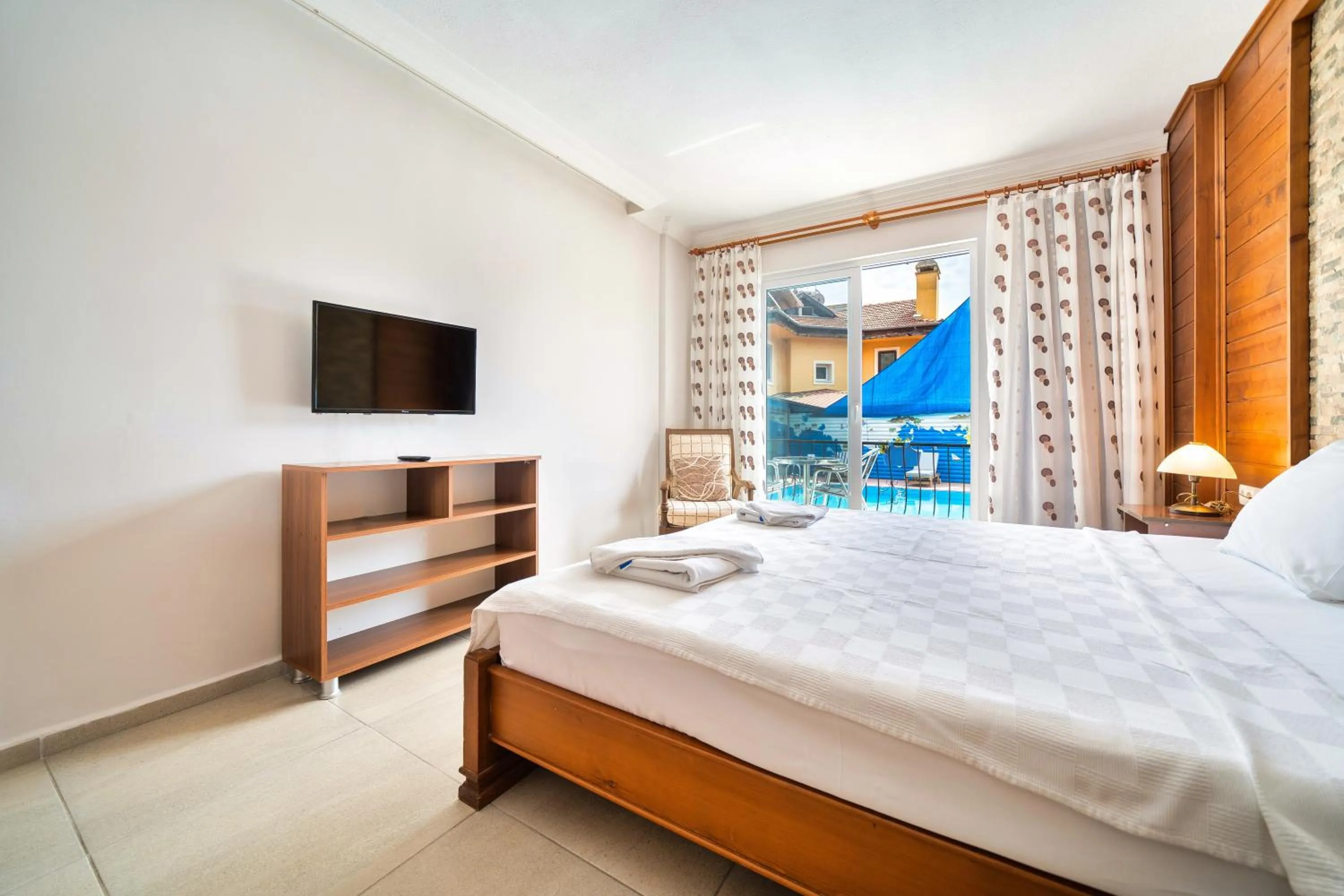 Bed in Dedeminn Garden Hotel