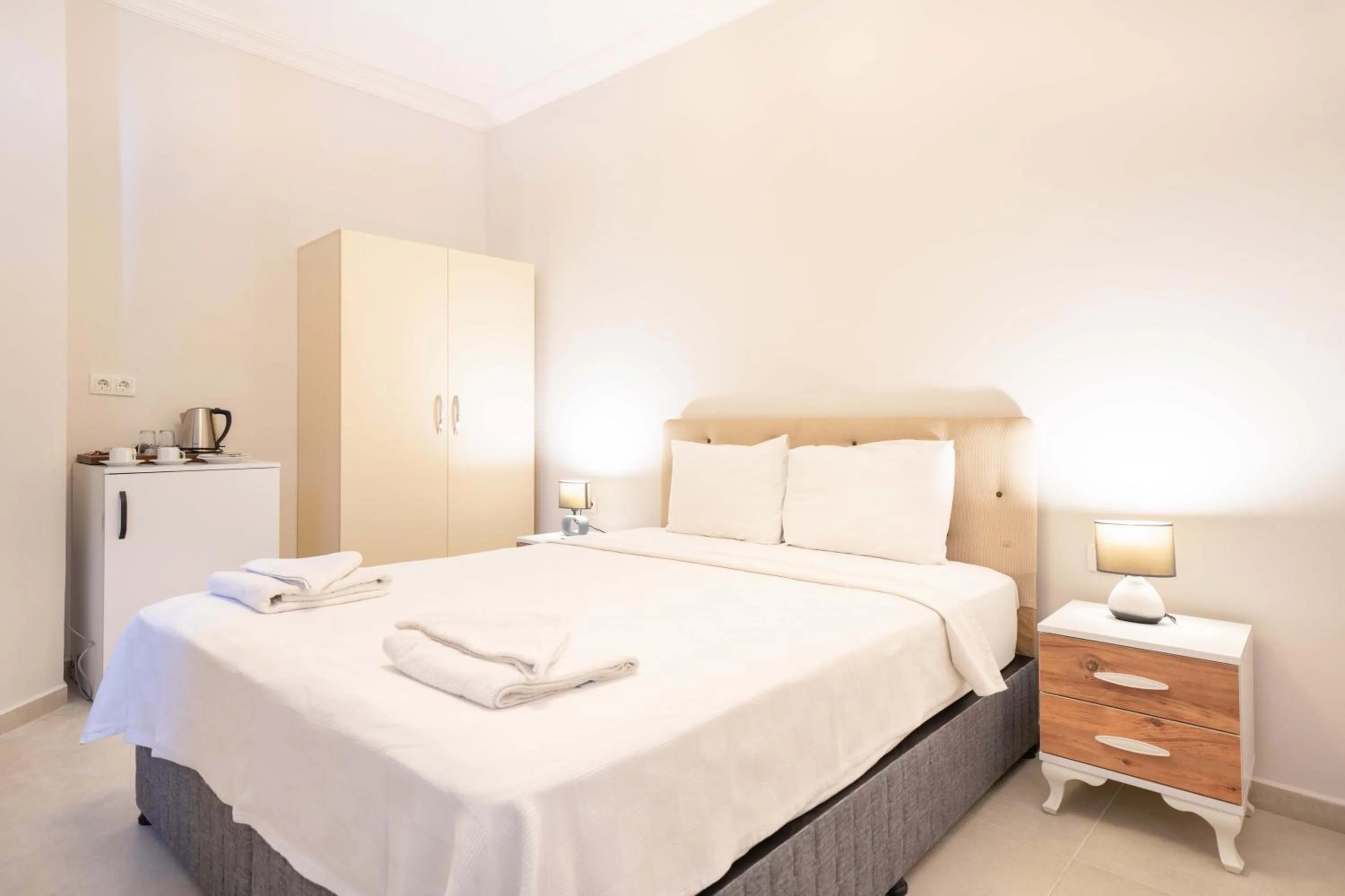 Bed in Dedeminn Garden Hotel