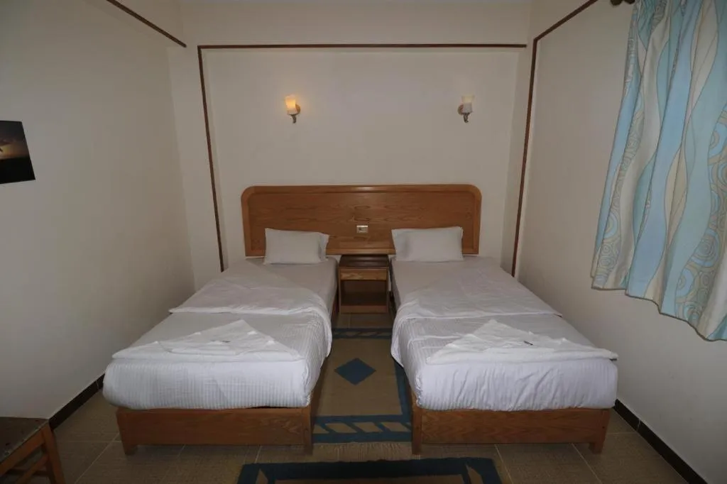 Bed in Acacia Dahab Hotel