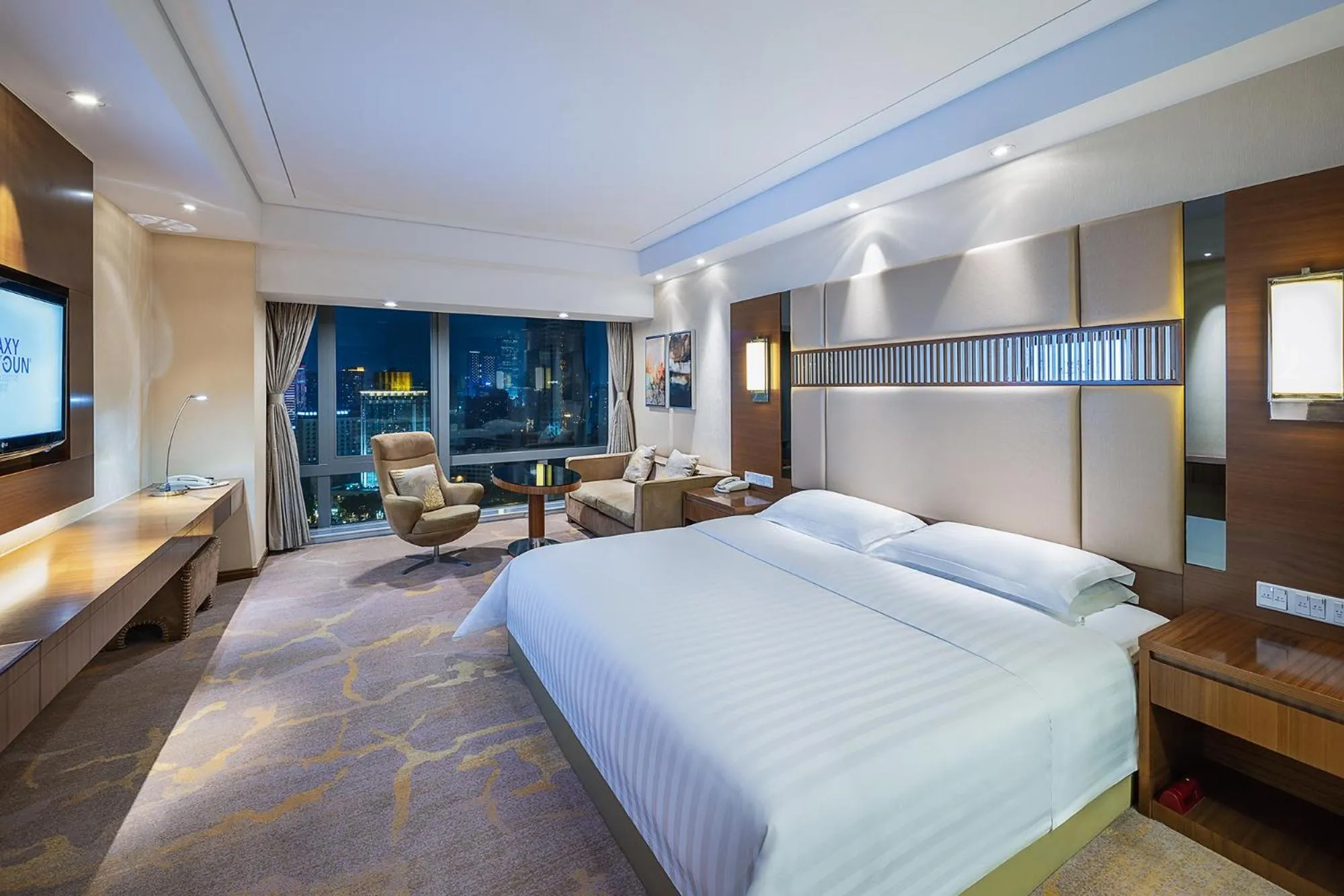 Bed in Galaxy minyoun Chengdu Hotel