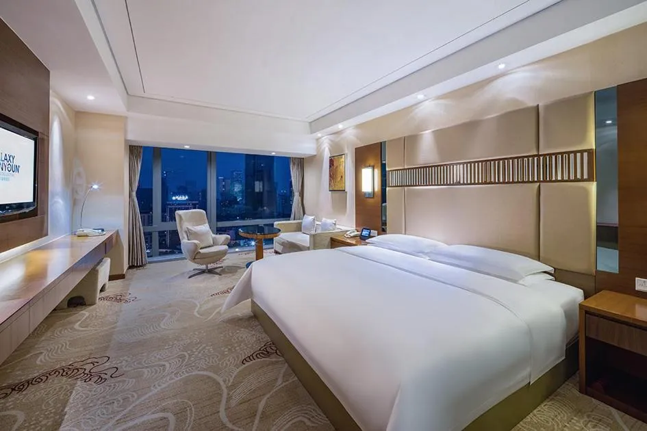 Bed in Galaxy minyoun Chengdu Hotel