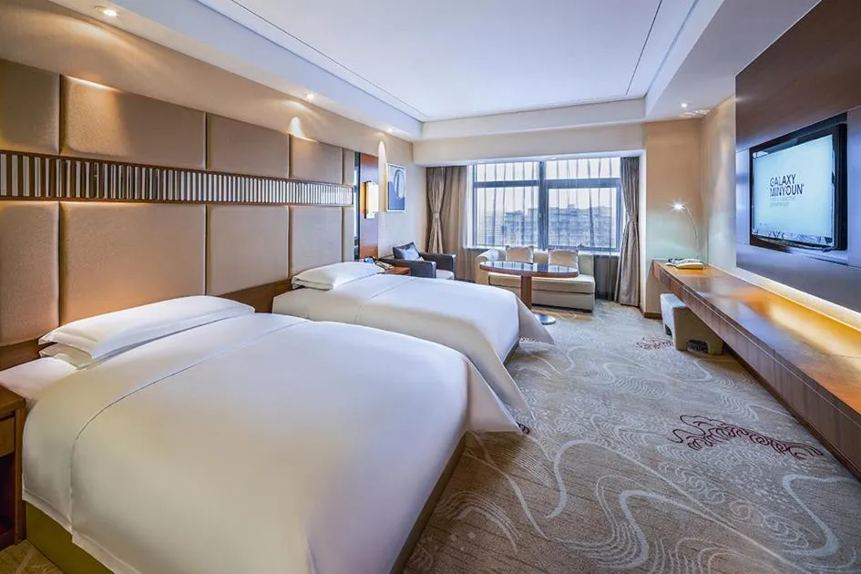 Bed in Galaxy minyoun Chengdu Hotel