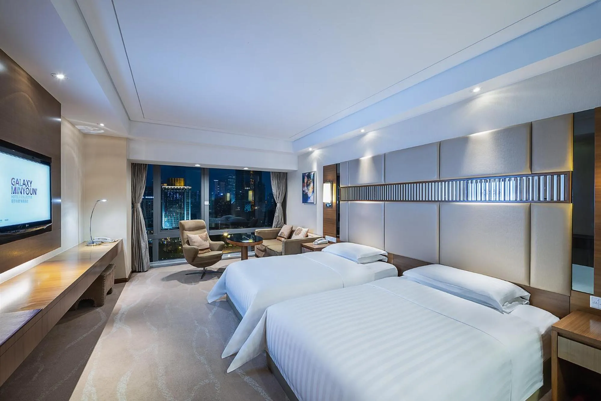 Bed in Galaxy minyoun Chengdu Hotel