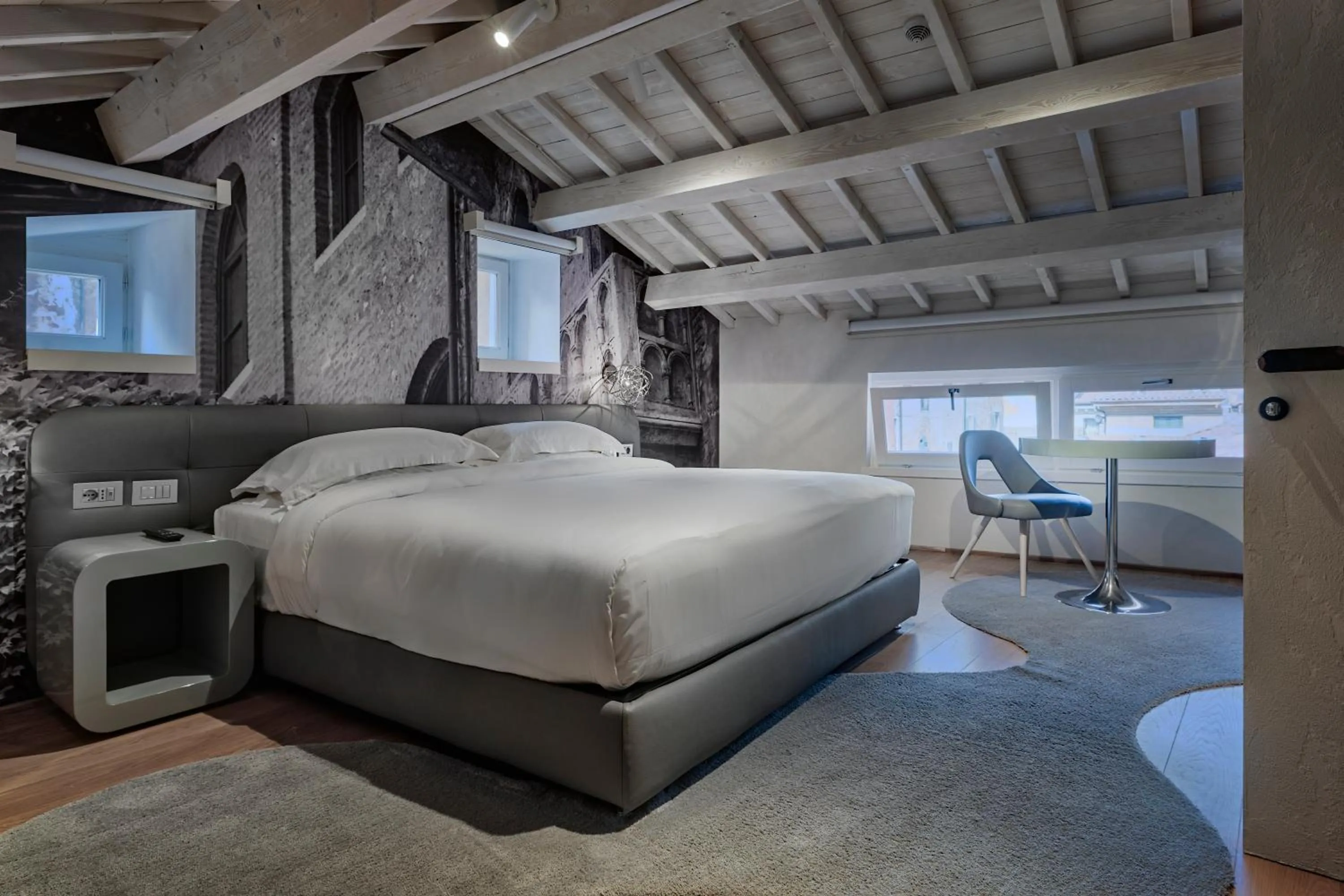 Bed in Lords of Verona Luxury Apartments