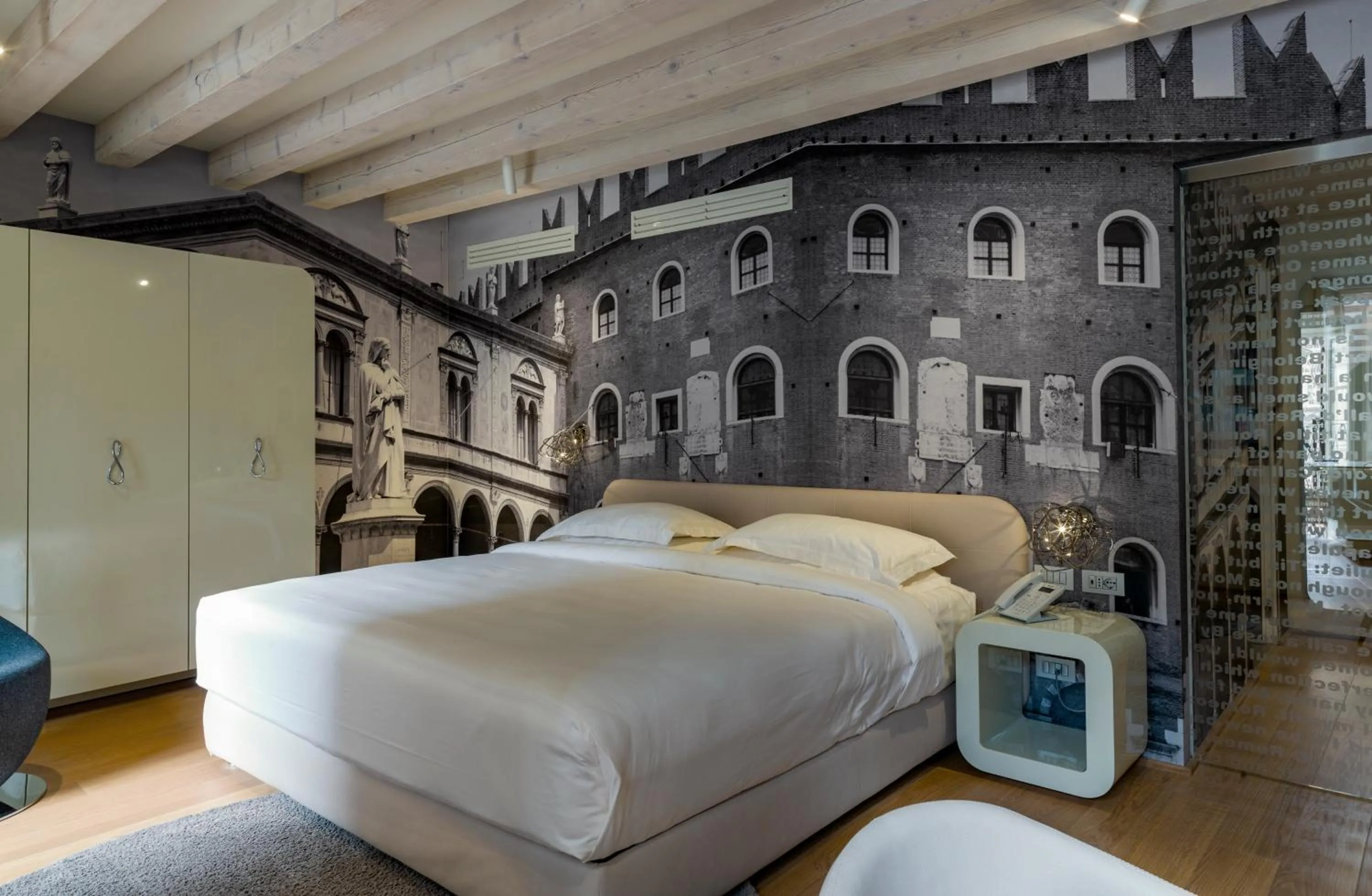 Bed in Lords of Verona Luxury Apartments