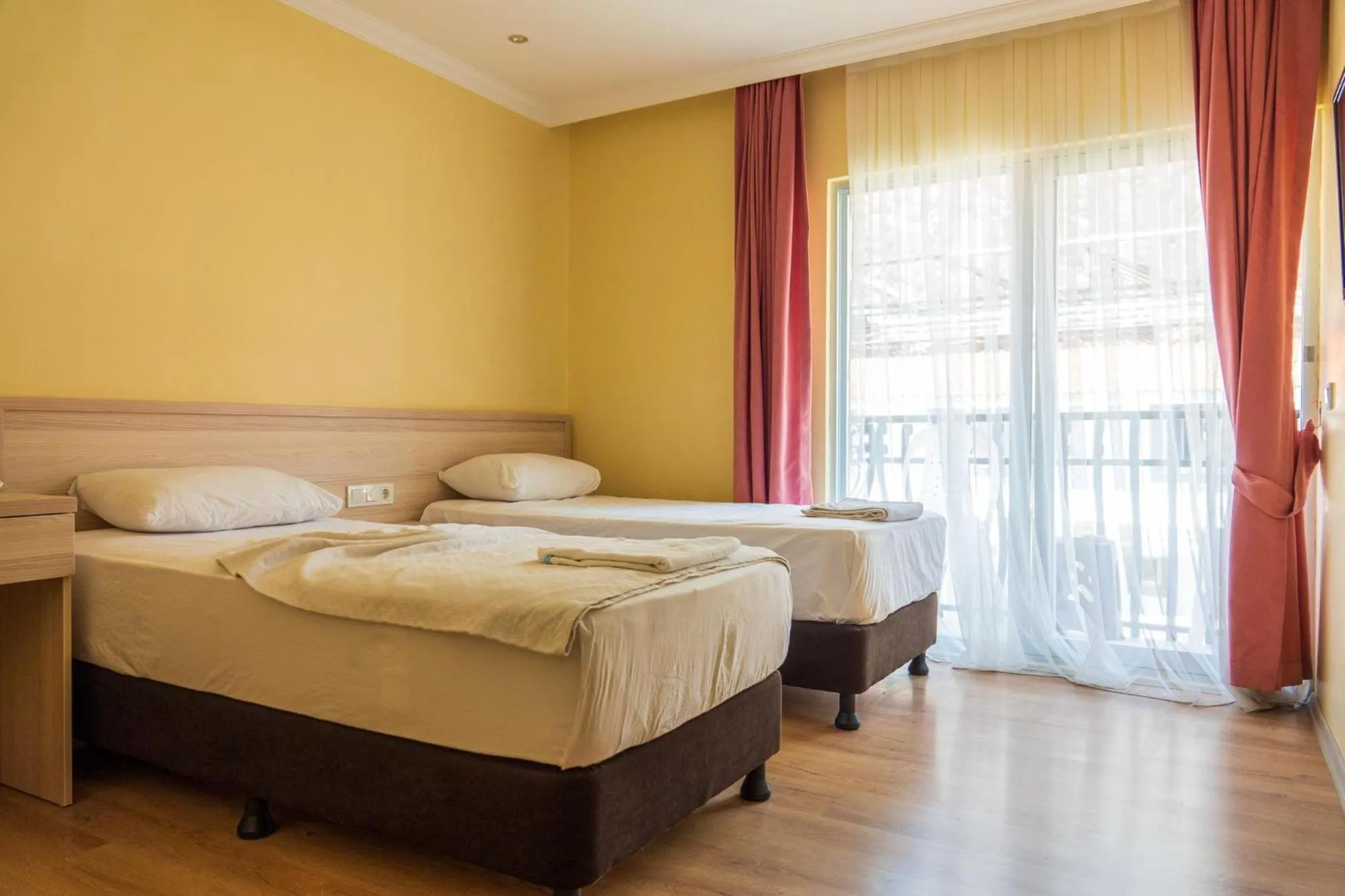 Bedroom in Magic Tulip Beach Hotel