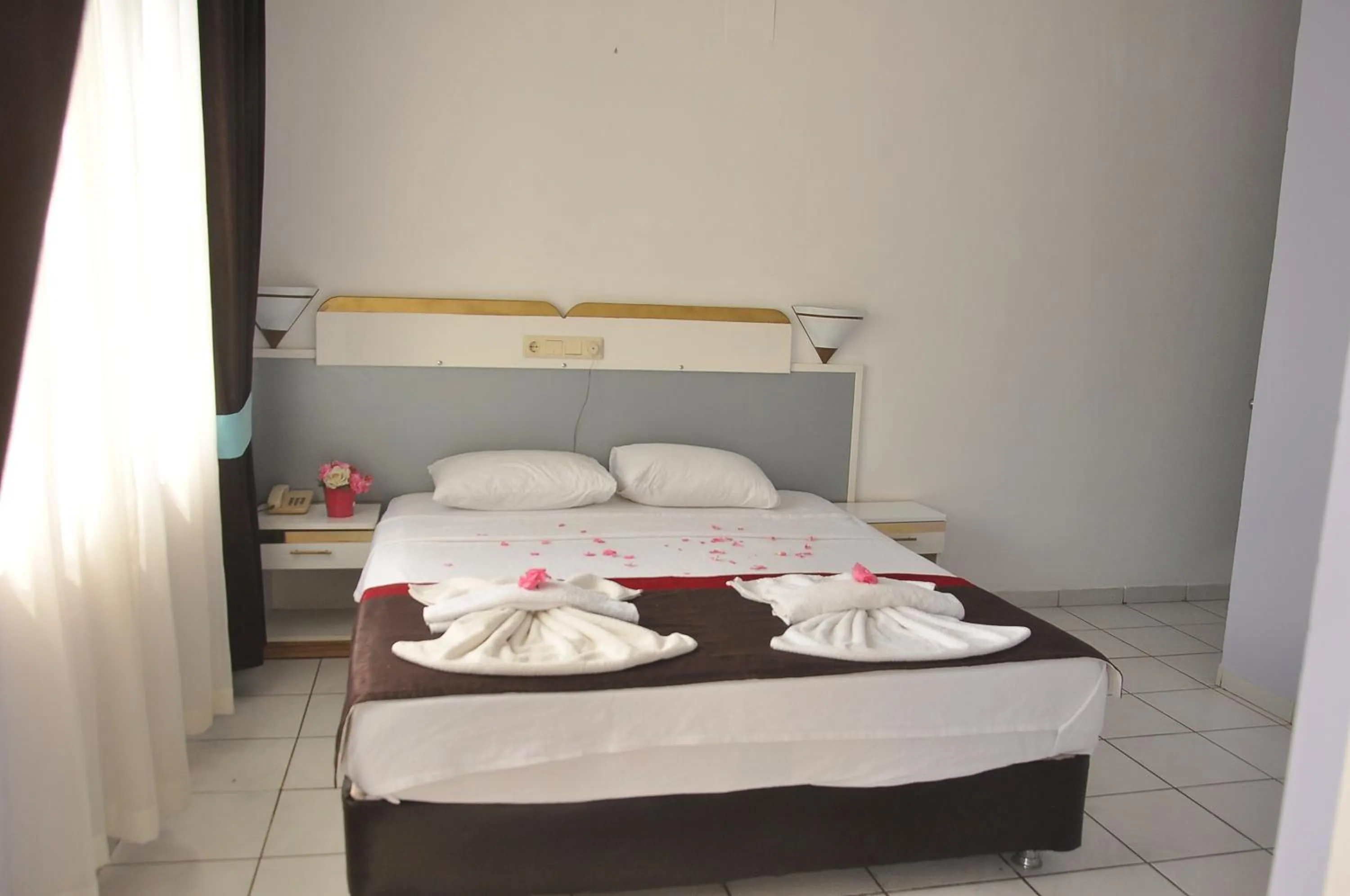 Bed in Resitalya Hotel