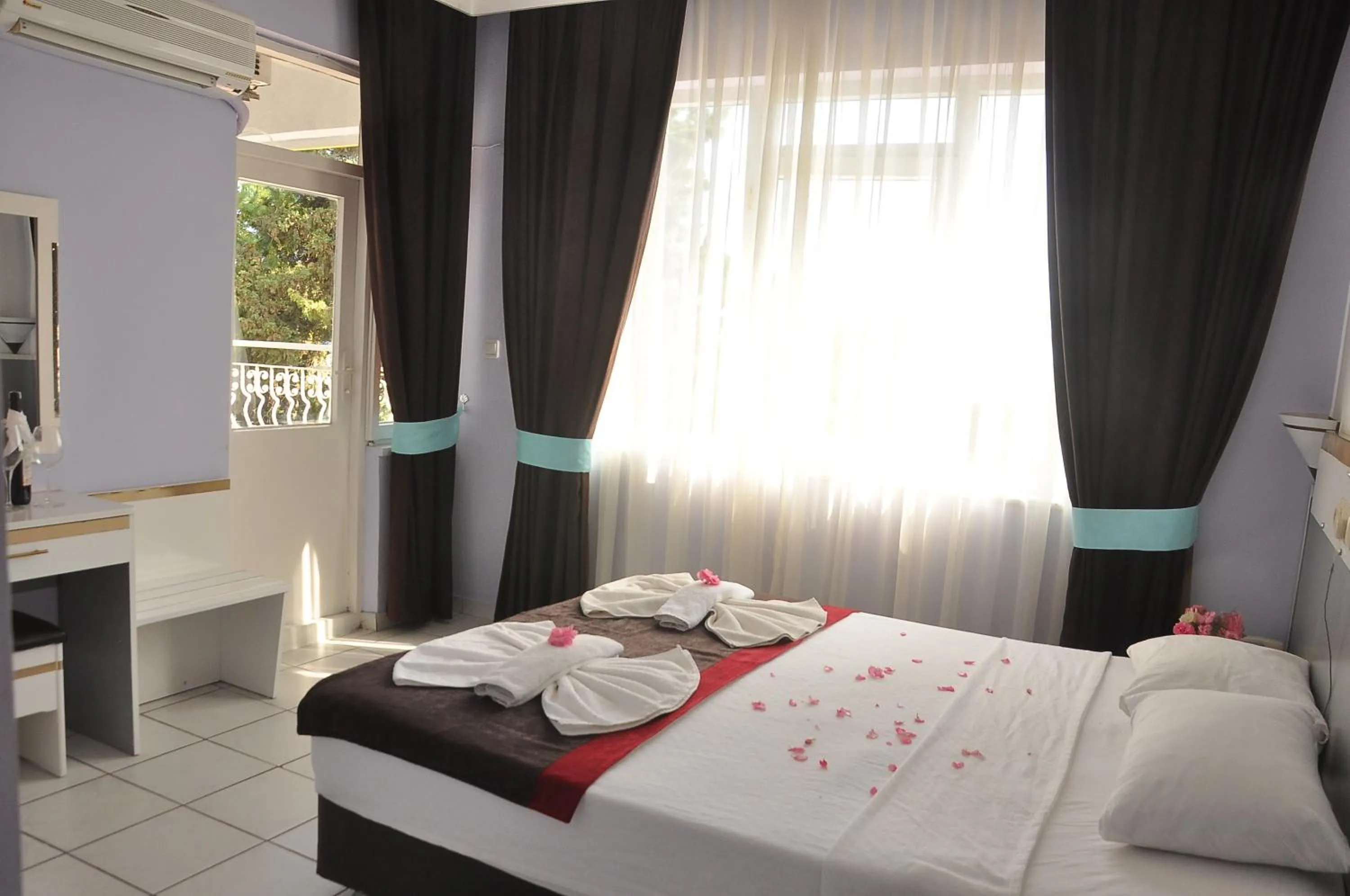 Bed in Resitalya Hotel