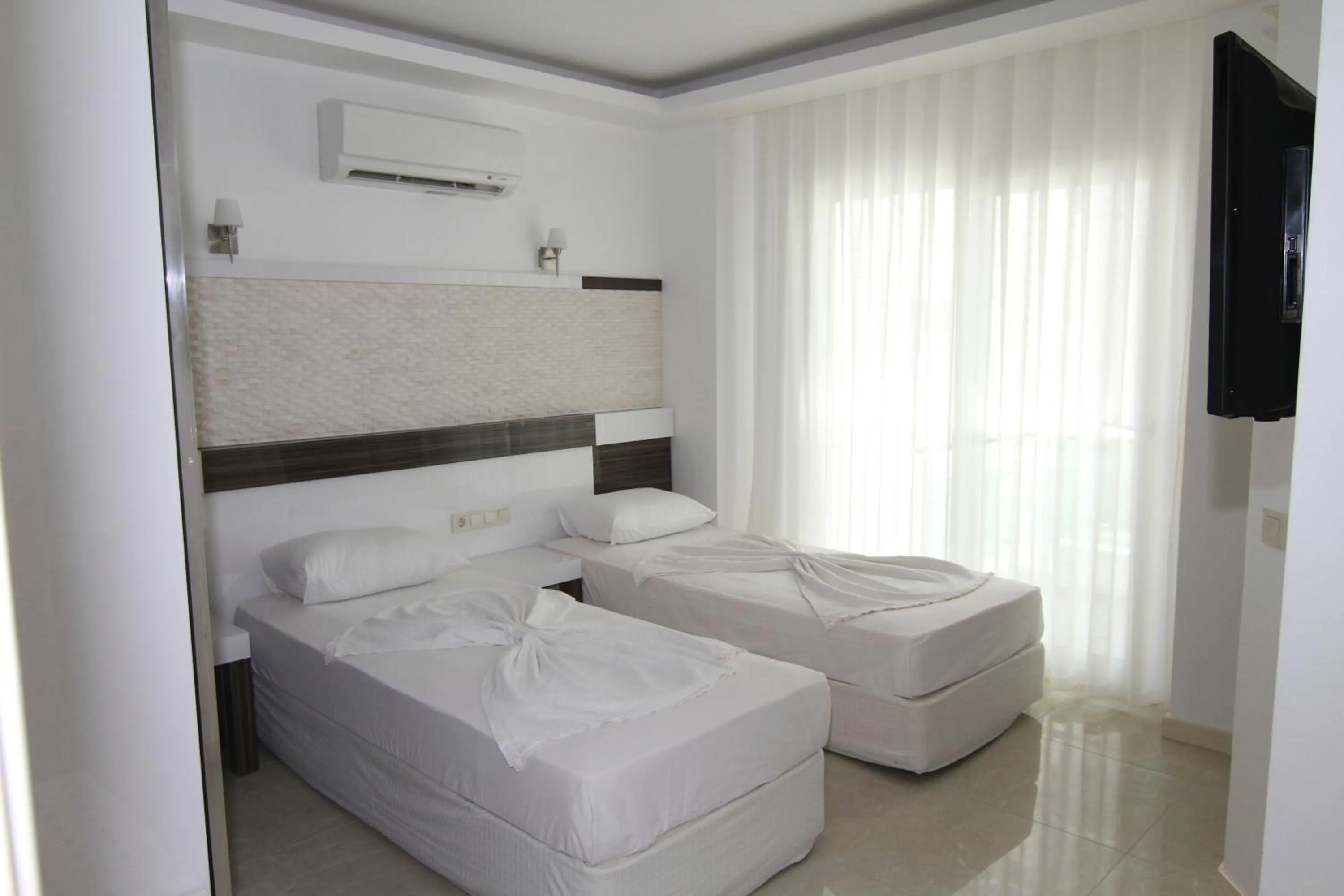 Bed in Kas Maki Hotel