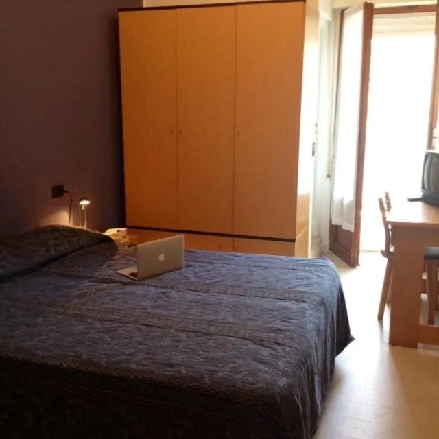 Bed in Hotel Capitol