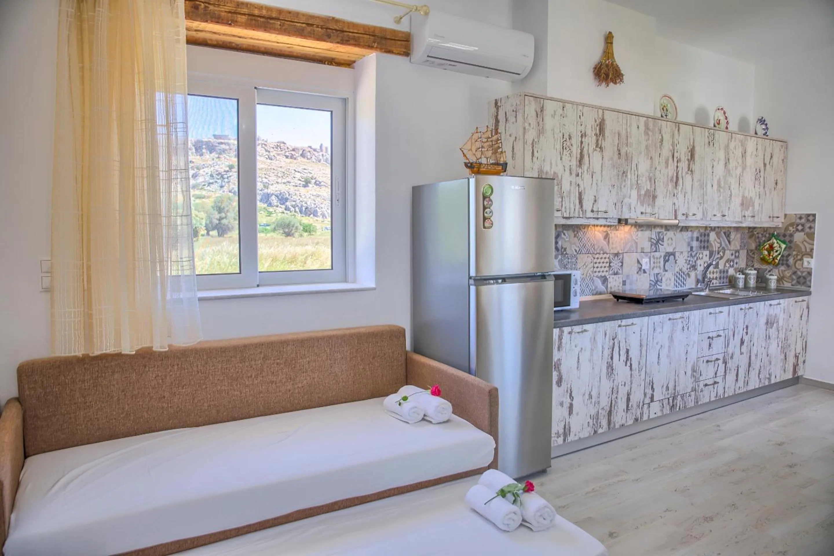 Coffee/tea facilities, Bed in Haraki Stone Apartments