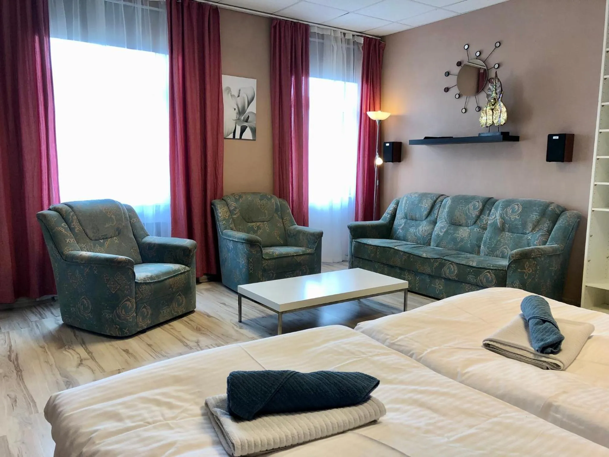 Seating area, Bed in Pension Village