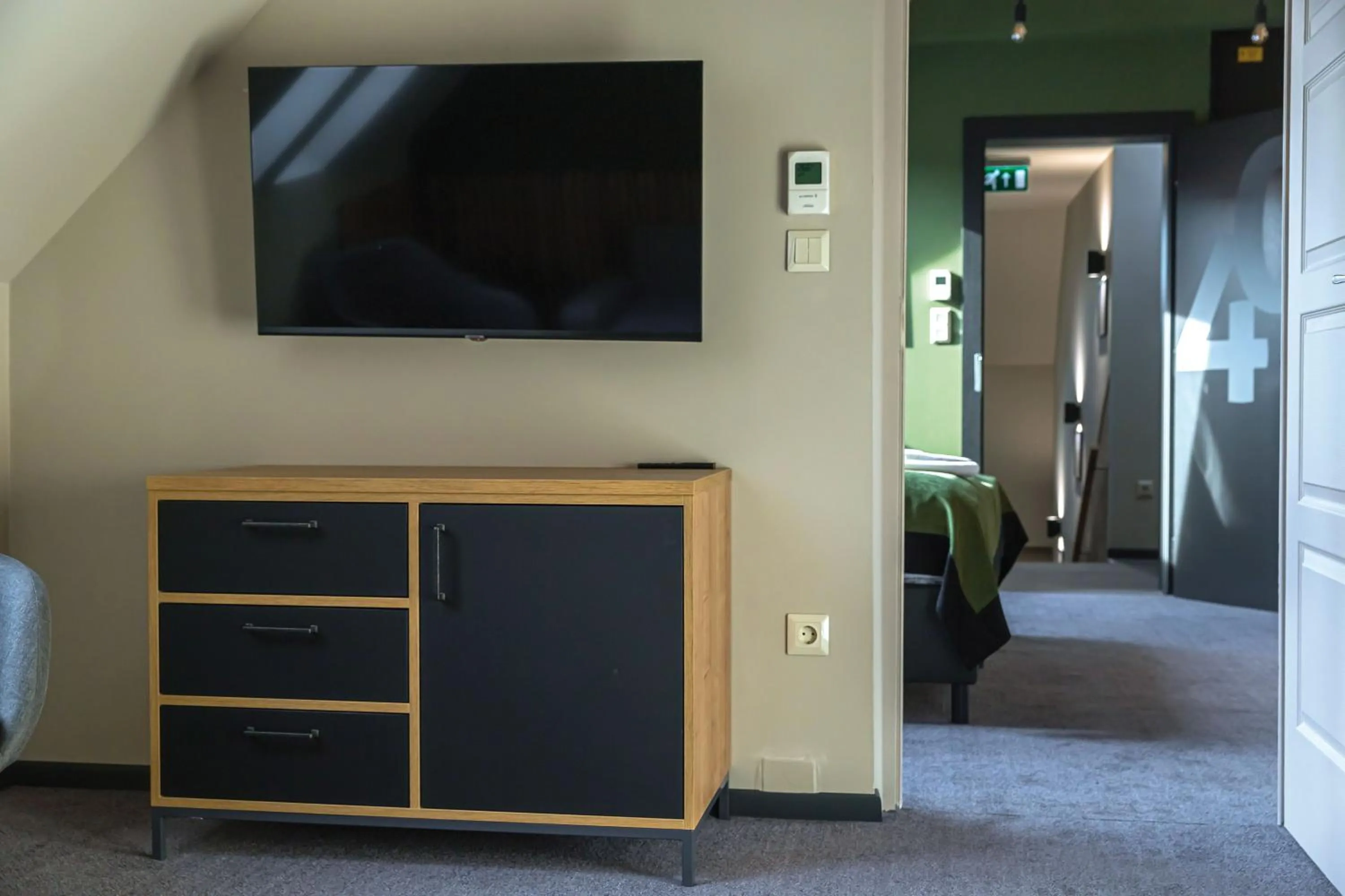 Communal lounge/ TV room in Oliva Hotel