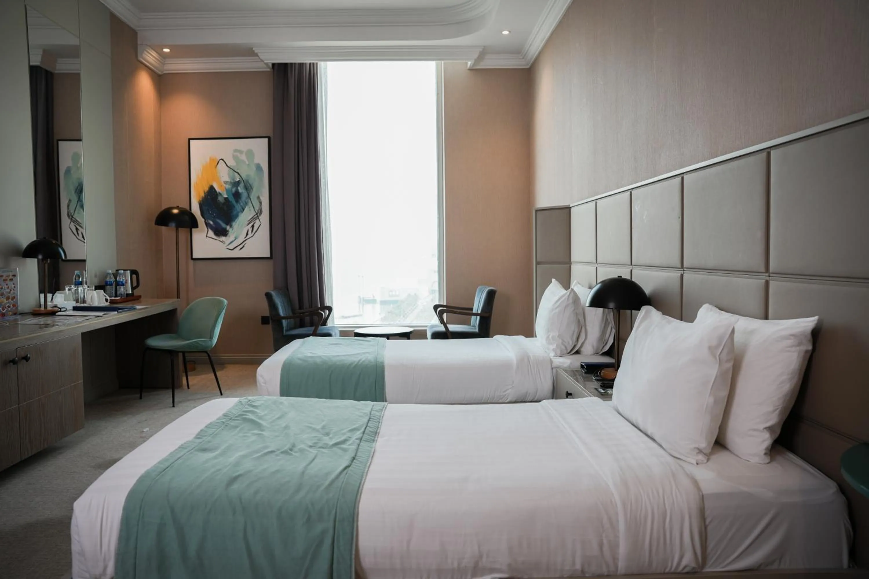 Bed in Horizon Manor Hotel