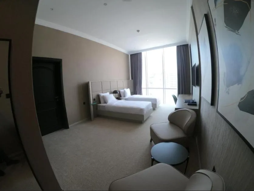 Bed in Horizon Manor Hotel