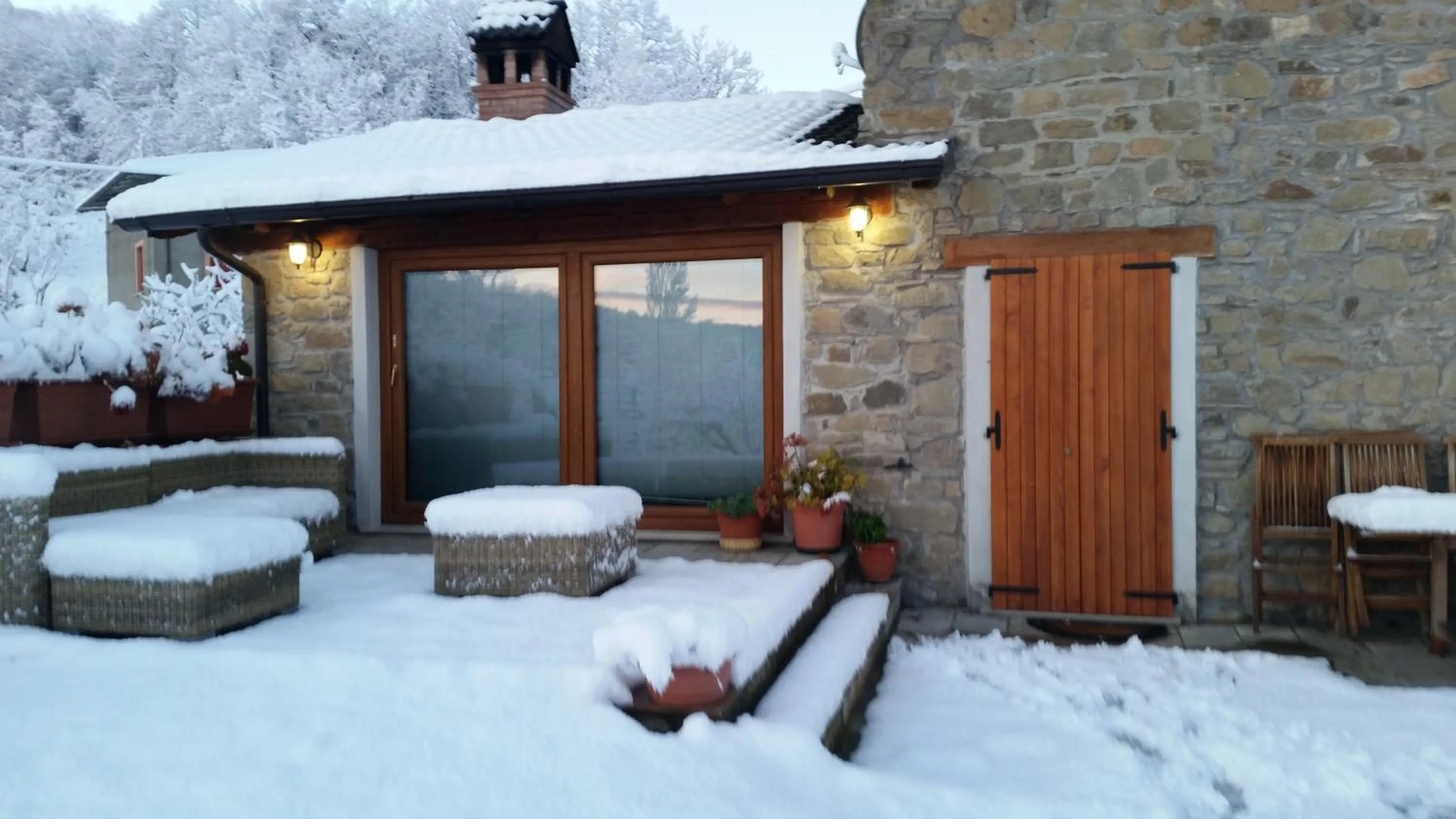 Facade/entrance in B&B Le Peschiere
