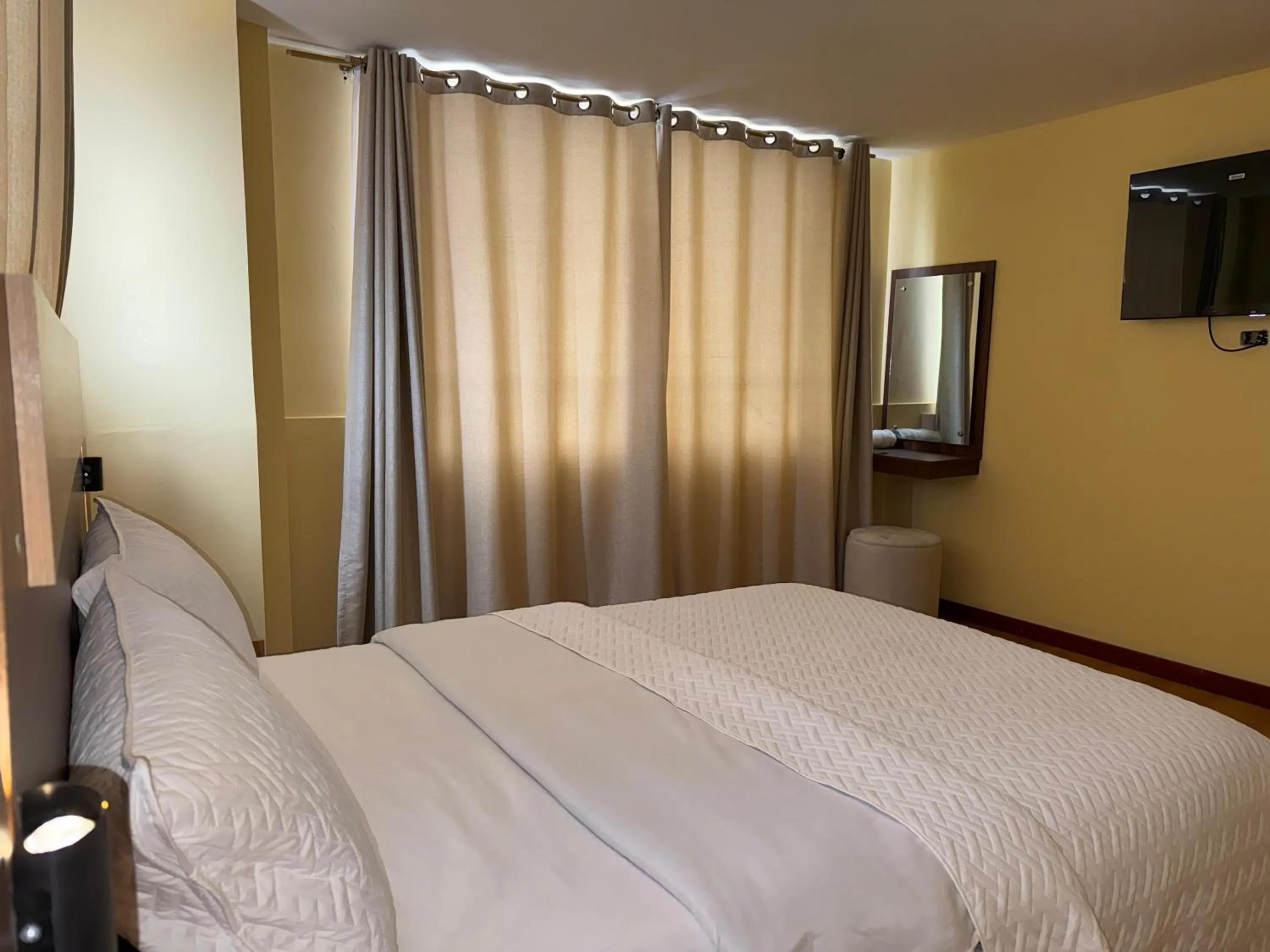 Bed in Hotel Suyusama