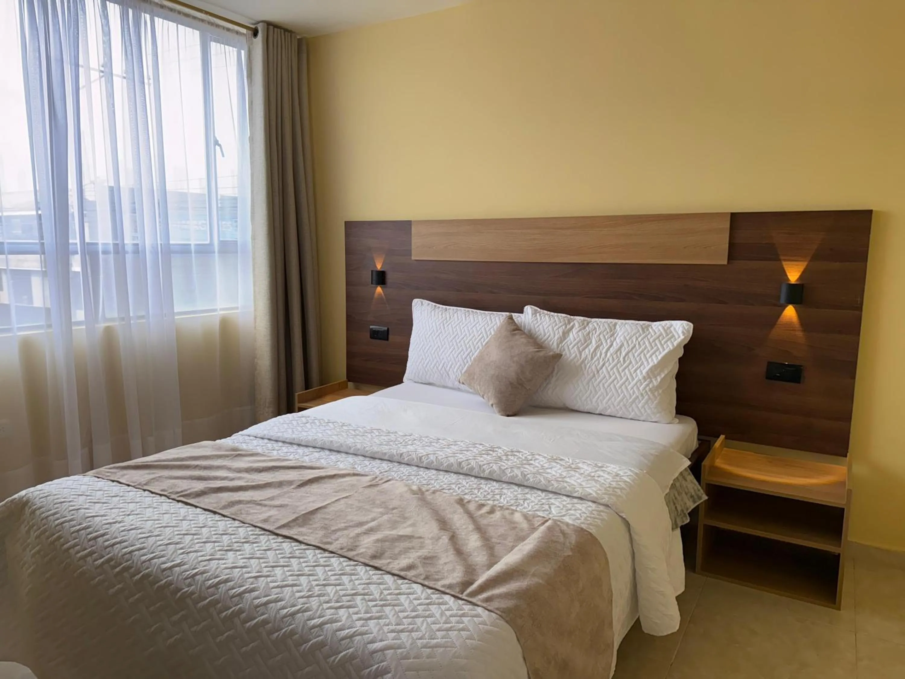 Bed in Hotel Suyusama