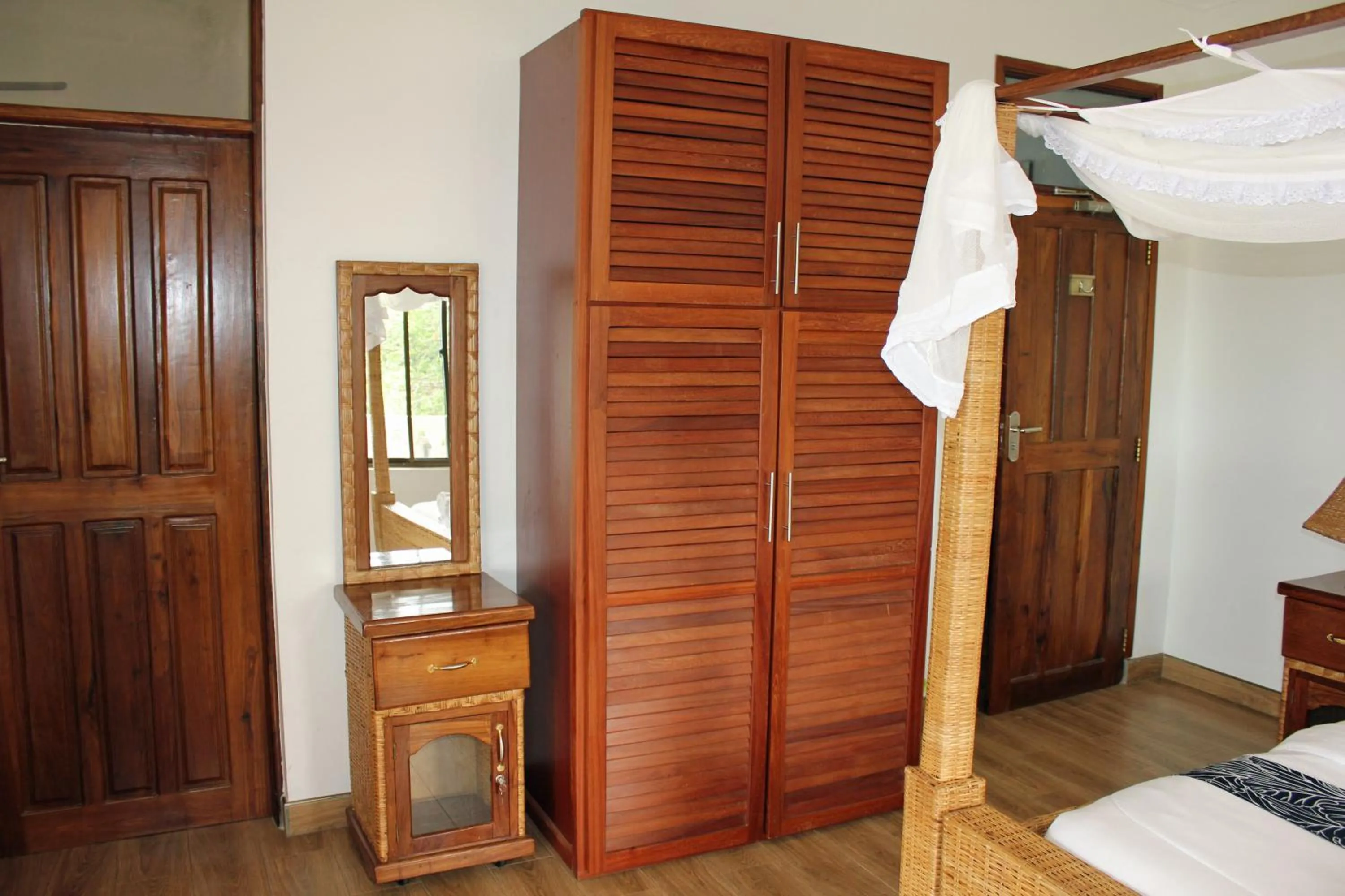 Bedroom, Bed in Villa Dahl Beach Resort