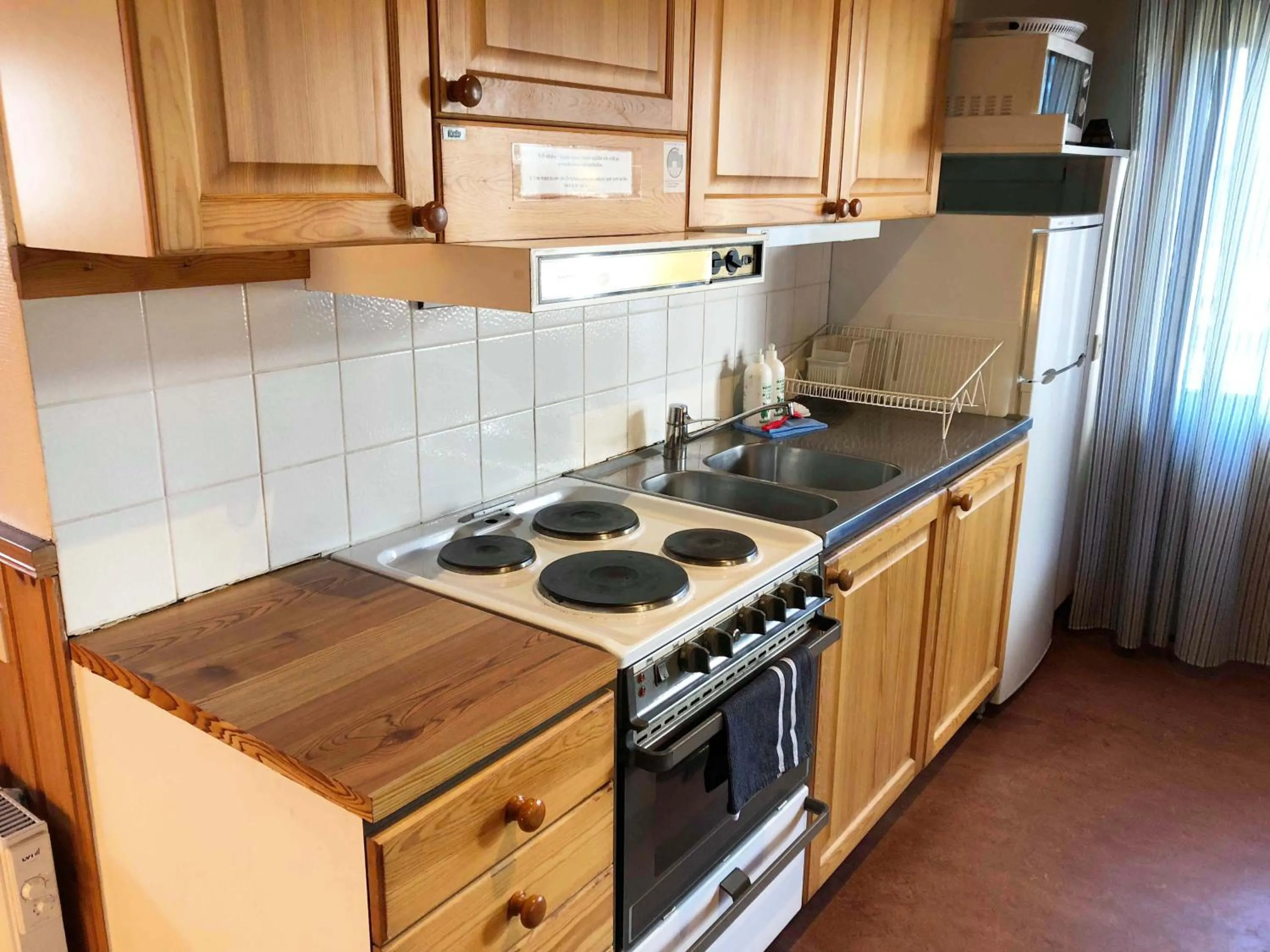 Kitchen or kitchenette in First Camp Enåbadet - Rättvik
