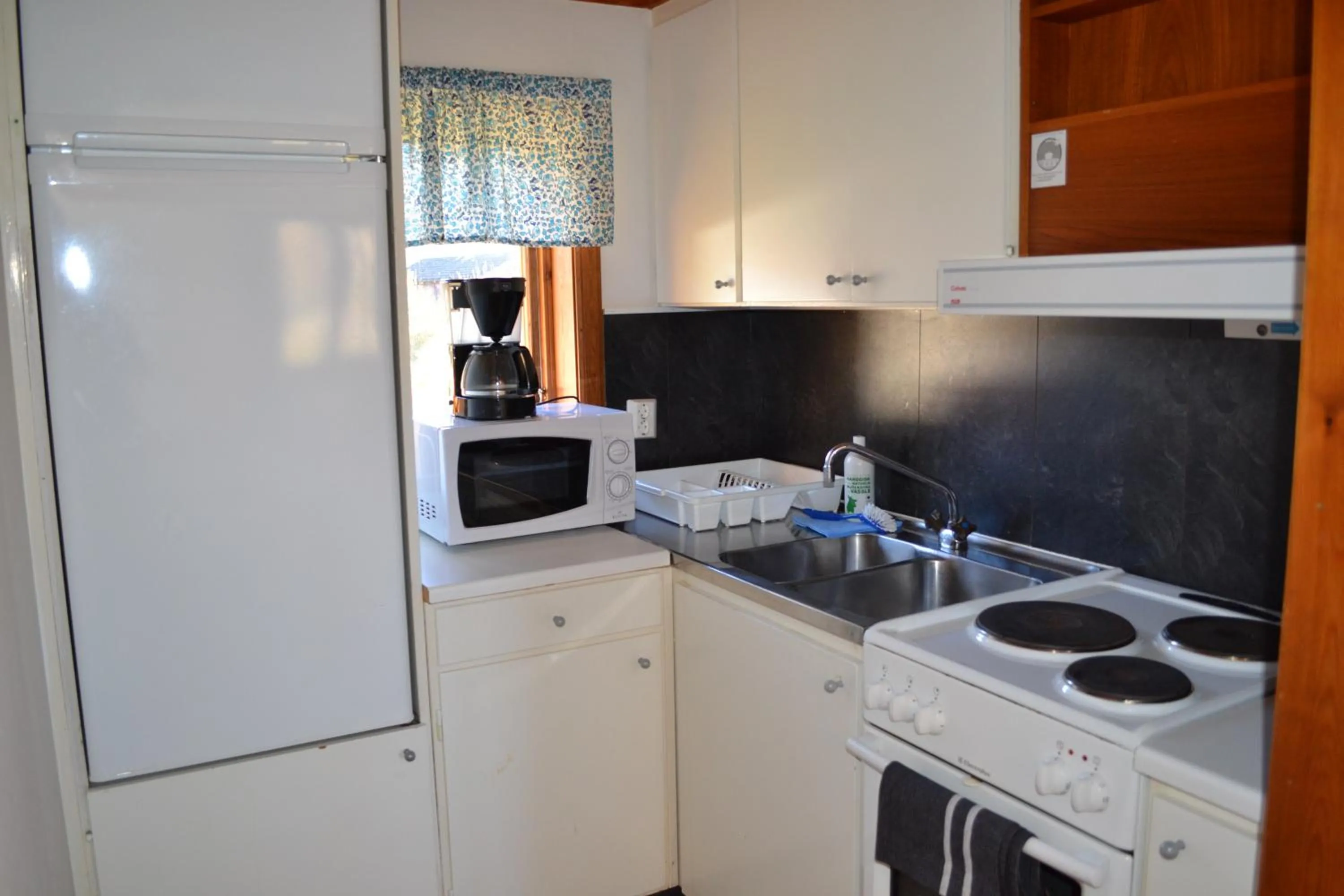 Kitchen or kitchenette in First Camp Enåbadet - Rättvik