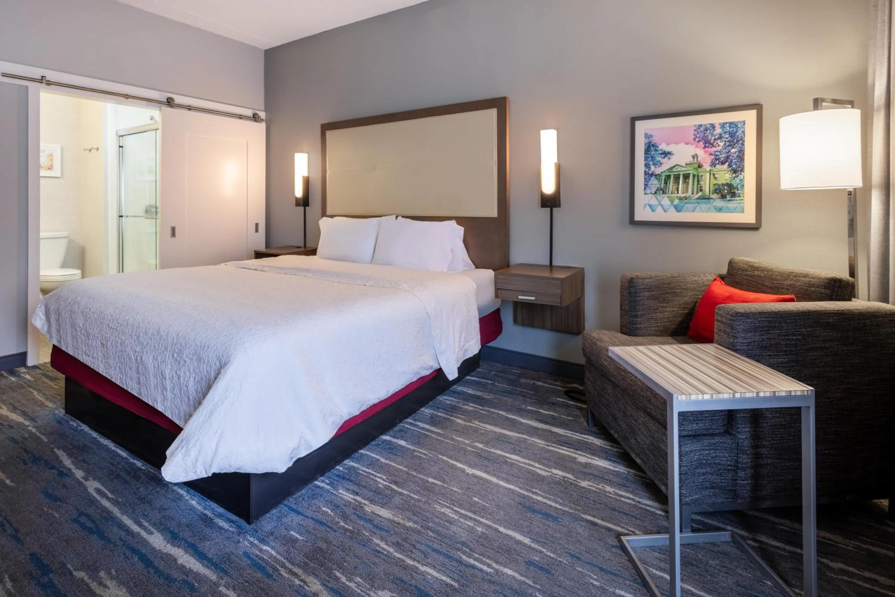 Living room, Bed in Hampton Inn Commerce