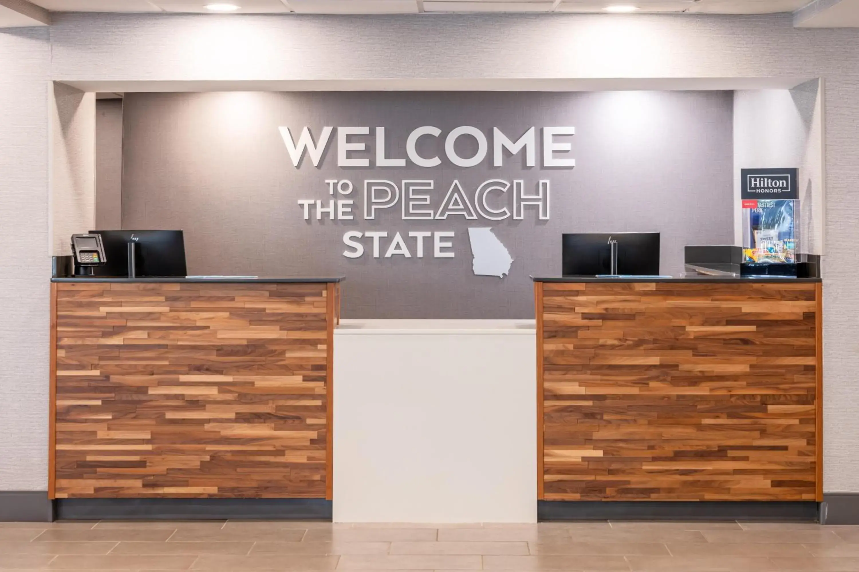 Lobby or reception in Hampton Inn Commerce Lobby or reception in Hampton Inn Commerce