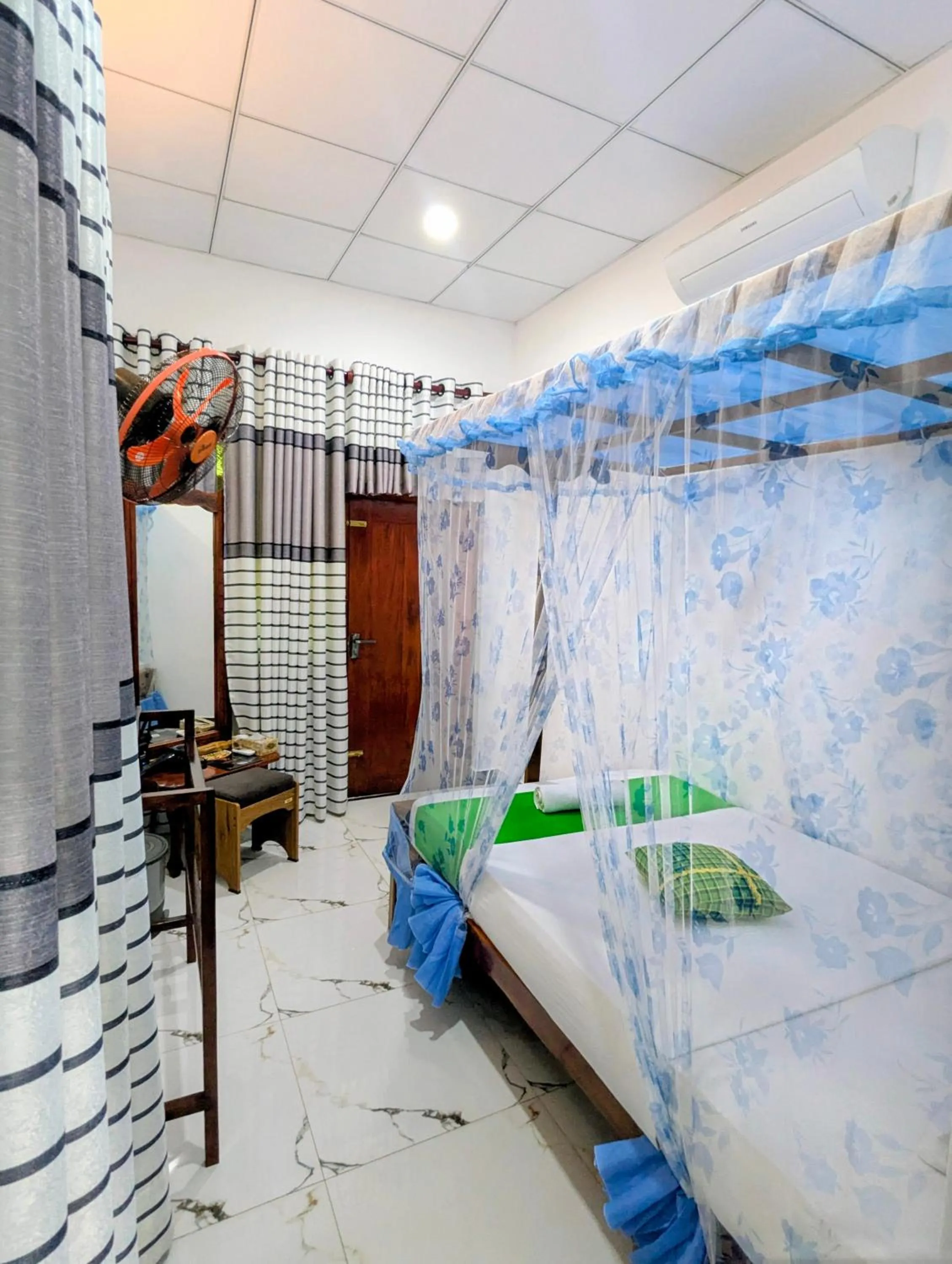 Bed in Nehansa Resort and safari