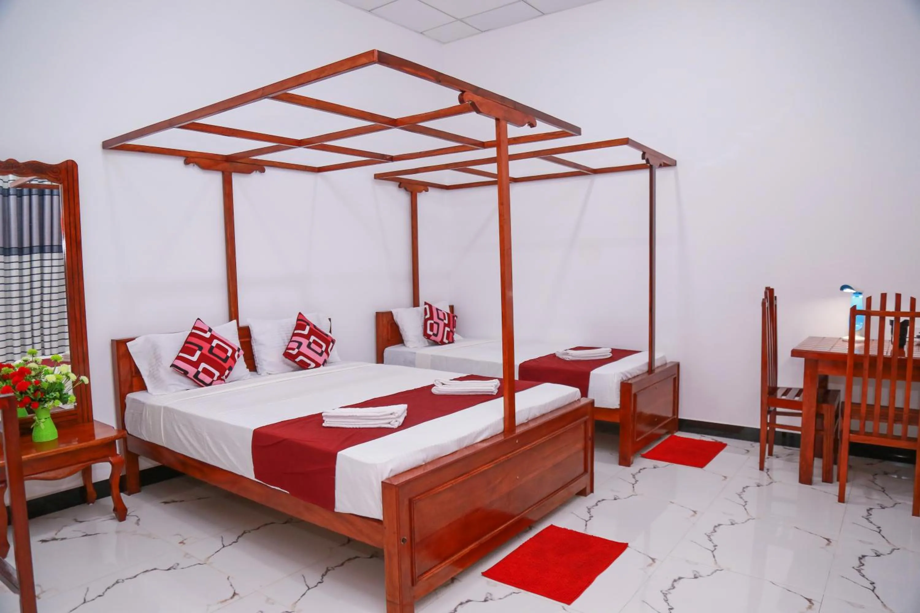 Bed in Nehansa Resort and safari