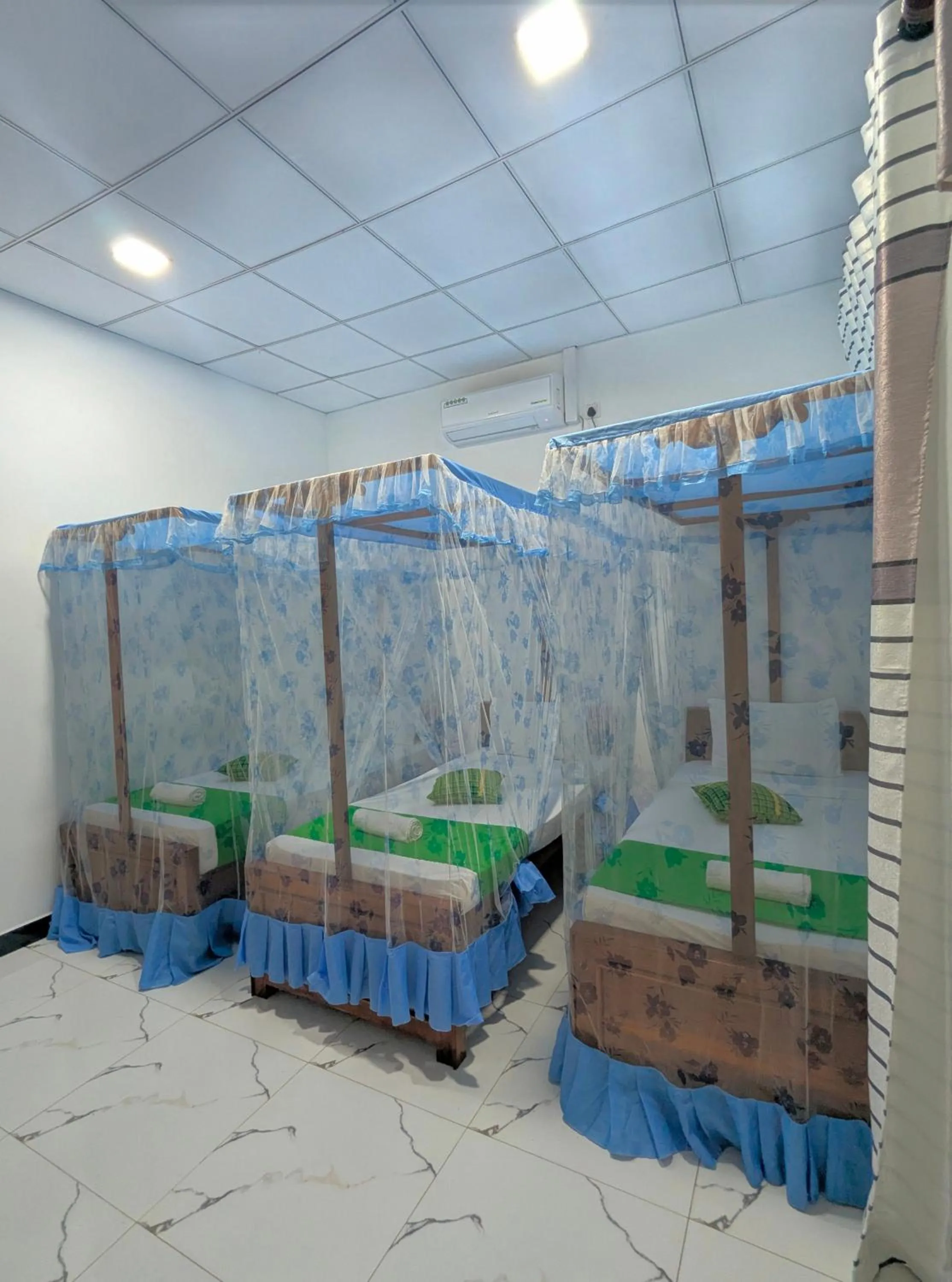 Bed in Nehansa Resort and safari