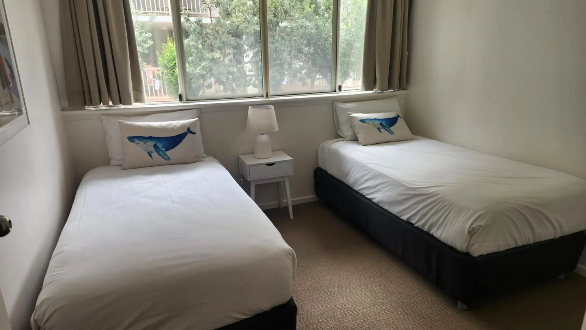 Bed in Whalewatch Ocean Beach Resort