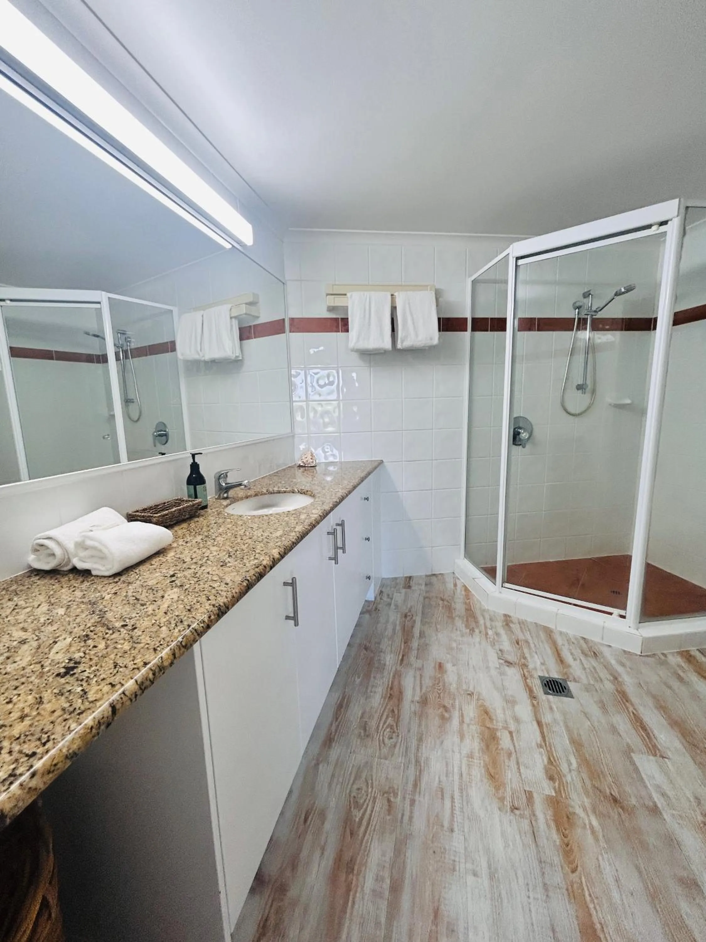 Shower in Whalewatch Ocean Beach Resort