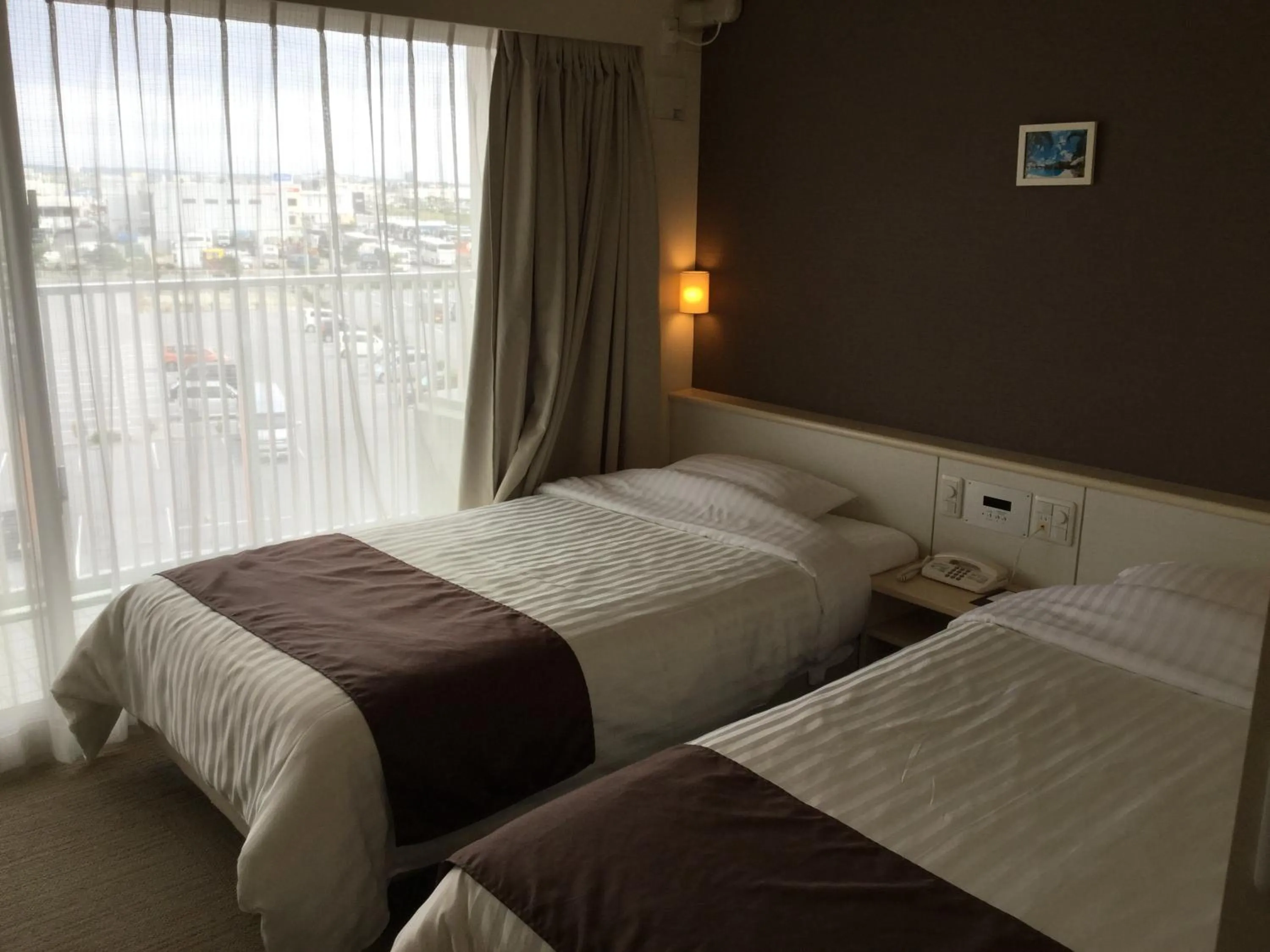 Photo of the whole room, Bed in Hotel Gran View Garden Okinawa