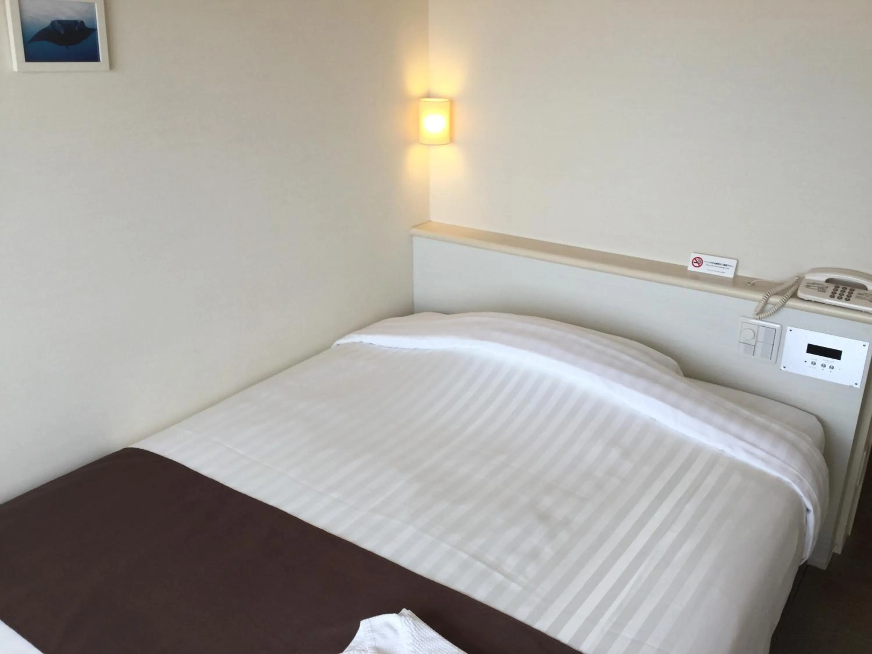 Bed in Hotel Gran View Garden Okinawa