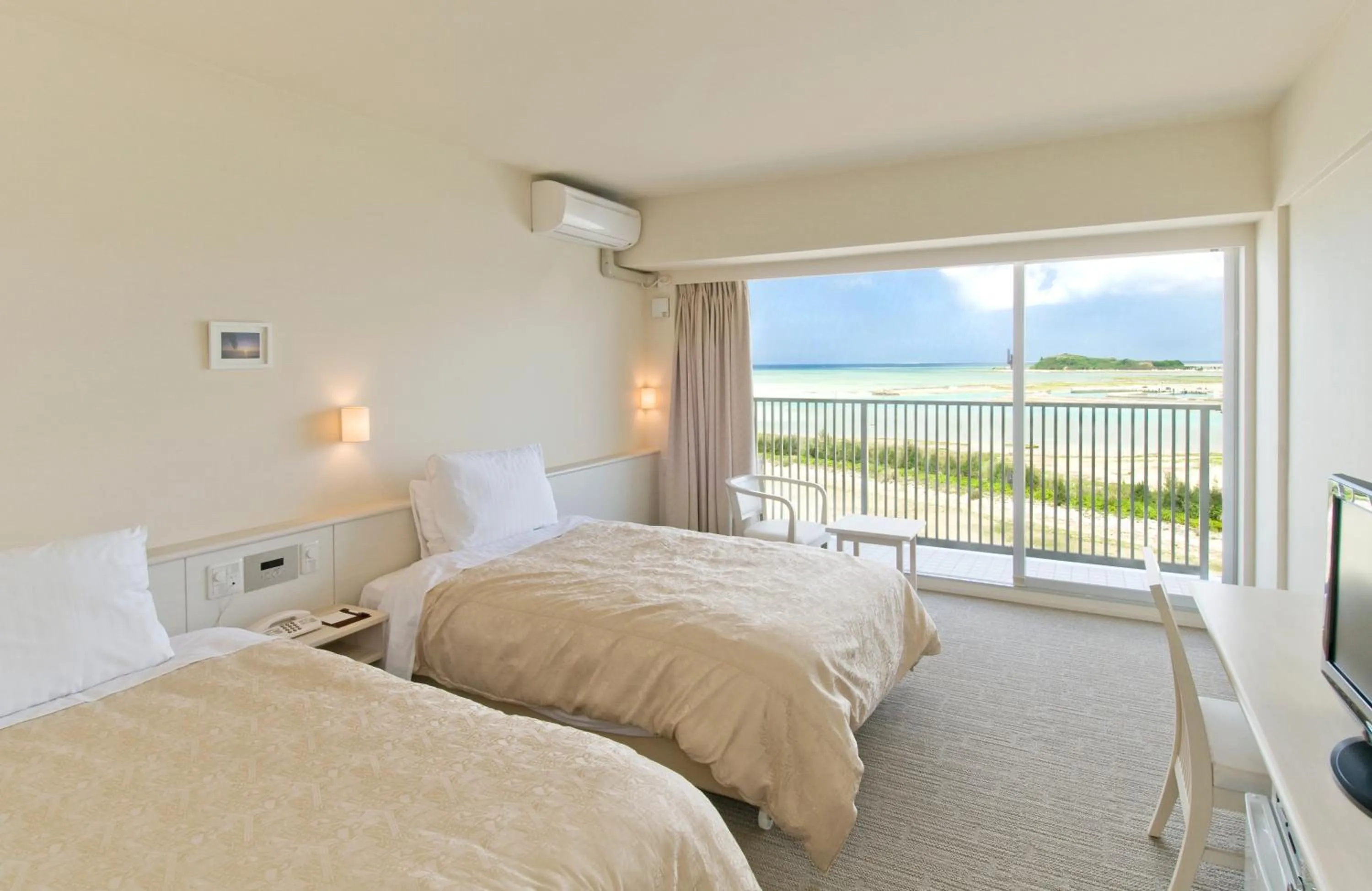 Photo of the whole room, Bed in Hotel Gran View Garden Okinawa