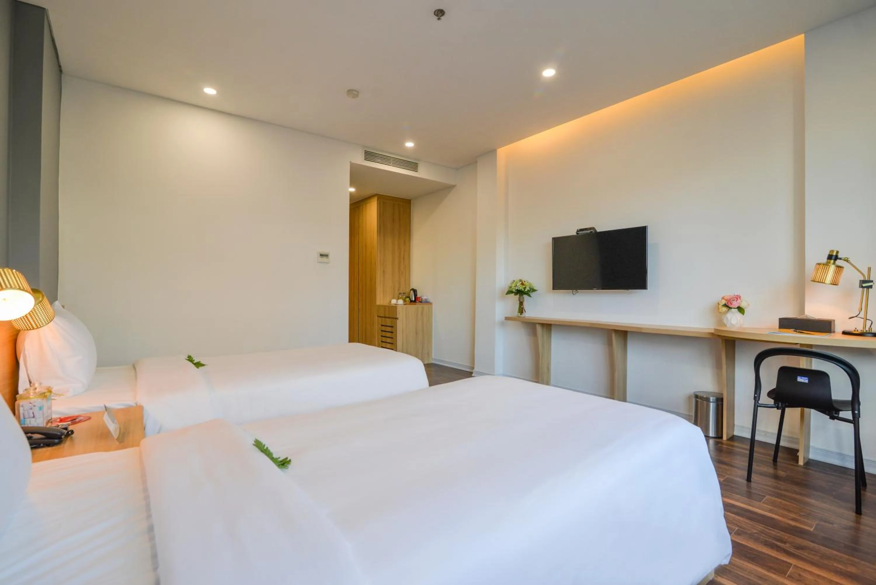 Bed in Magnolia Hotel