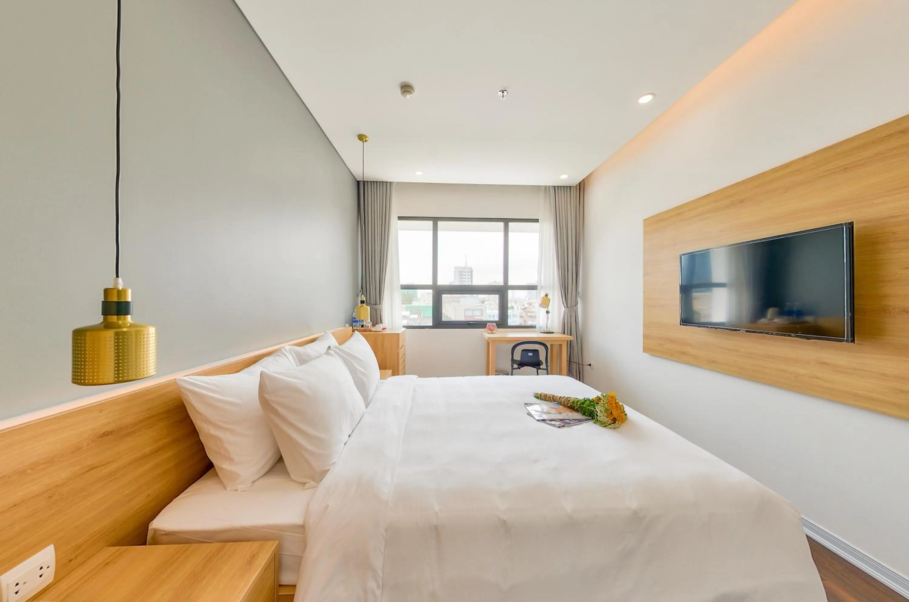 Bed in Magnolia Hotel