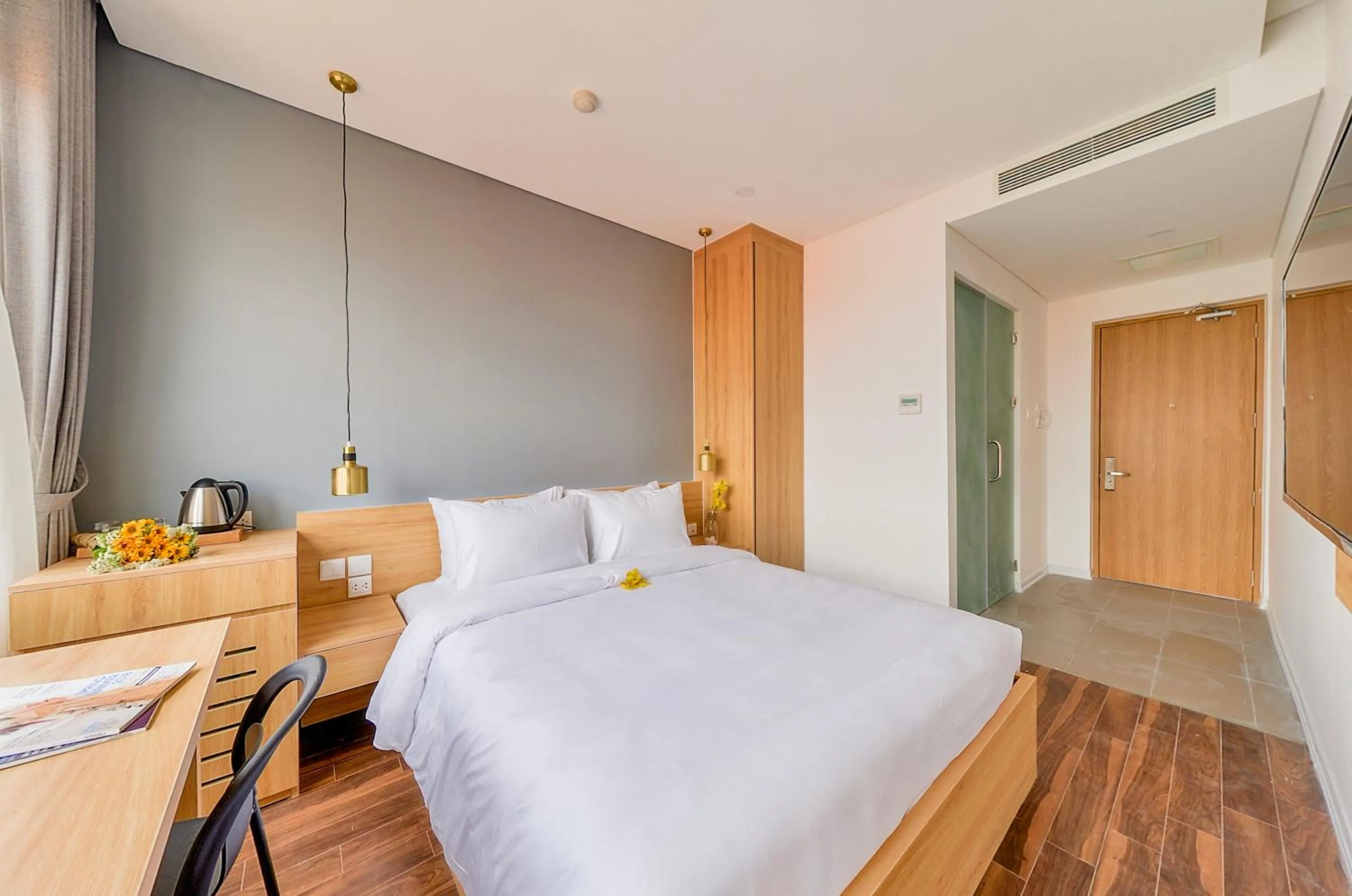 Bed in Magnolia Hotel