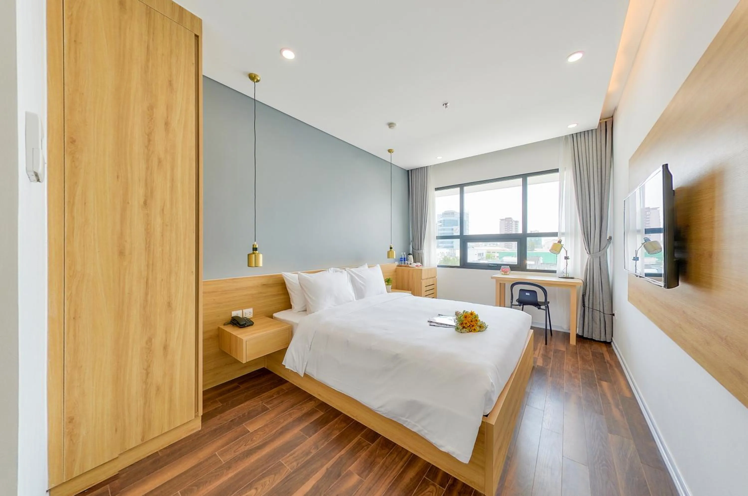 Bed in Magnolia Hotel