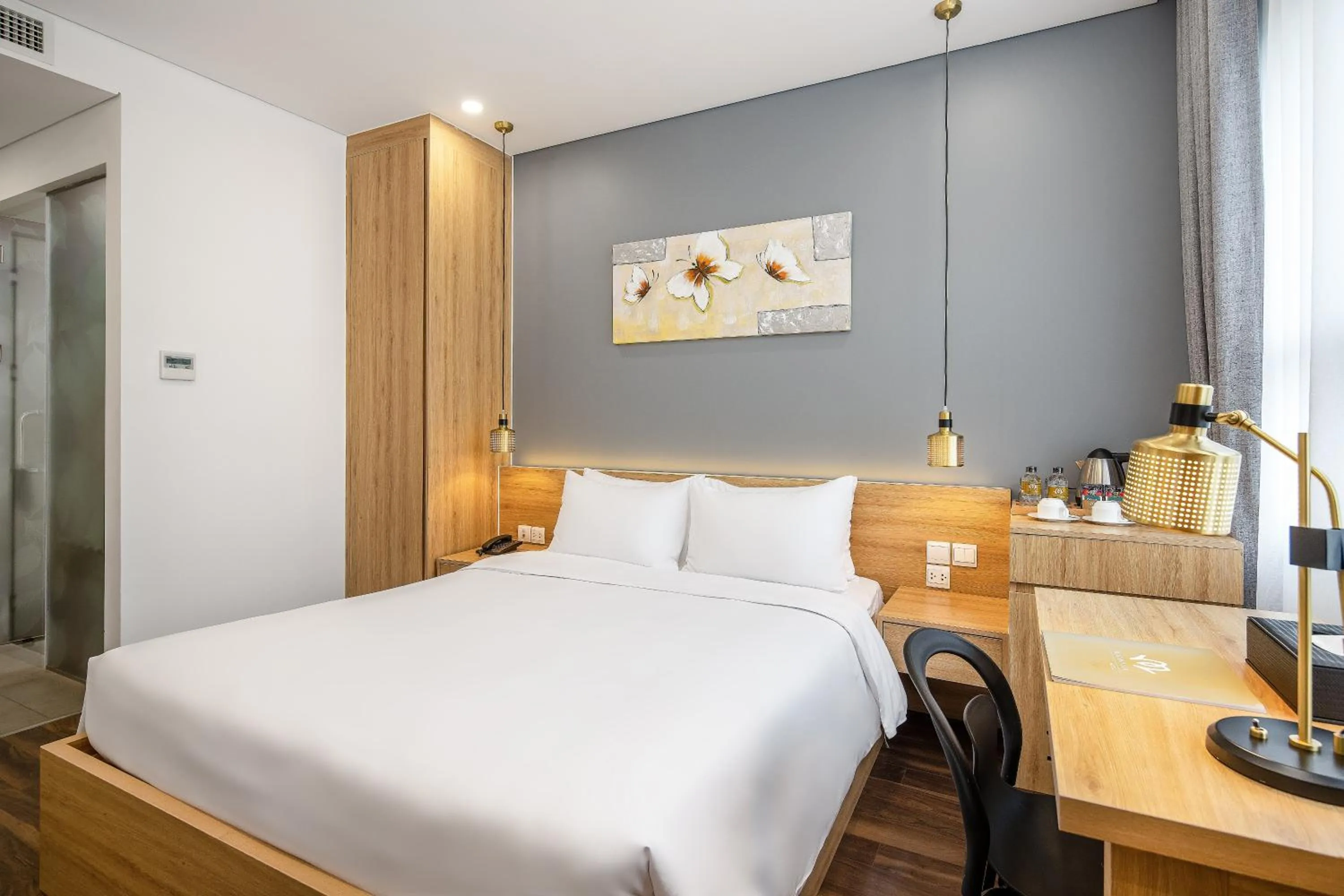 Bed in Magnolia Hotel