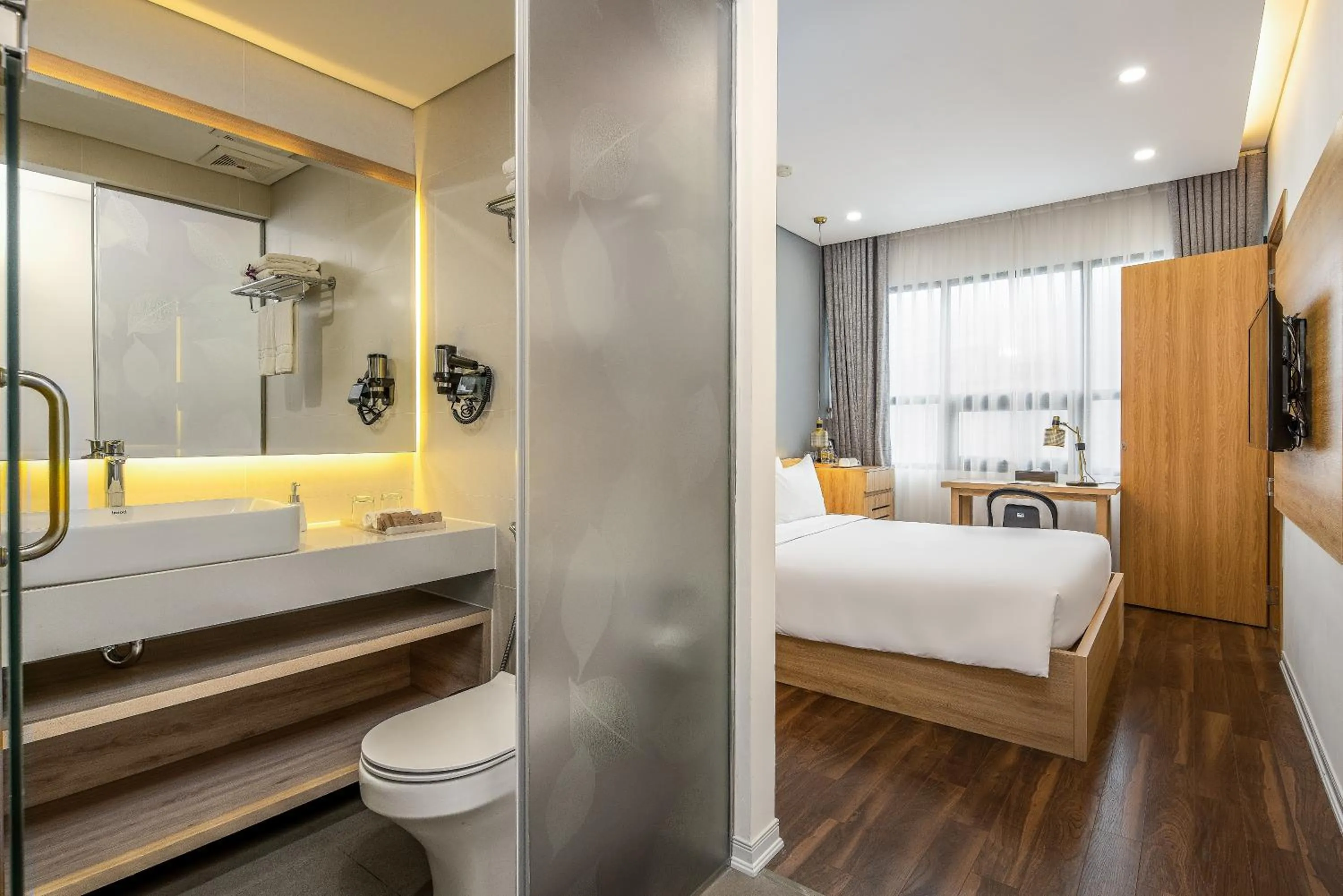 Bed in Magnolia Hotel