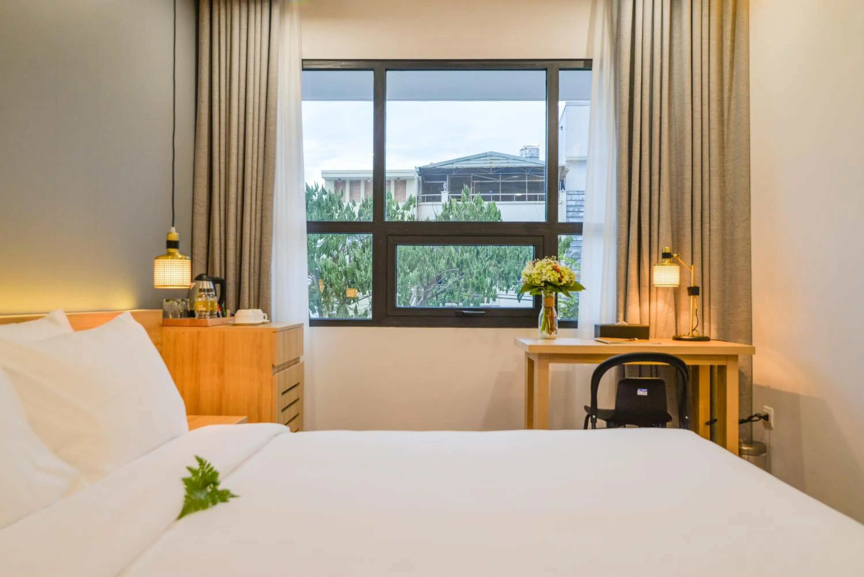 Bed in Magnolia Hotel