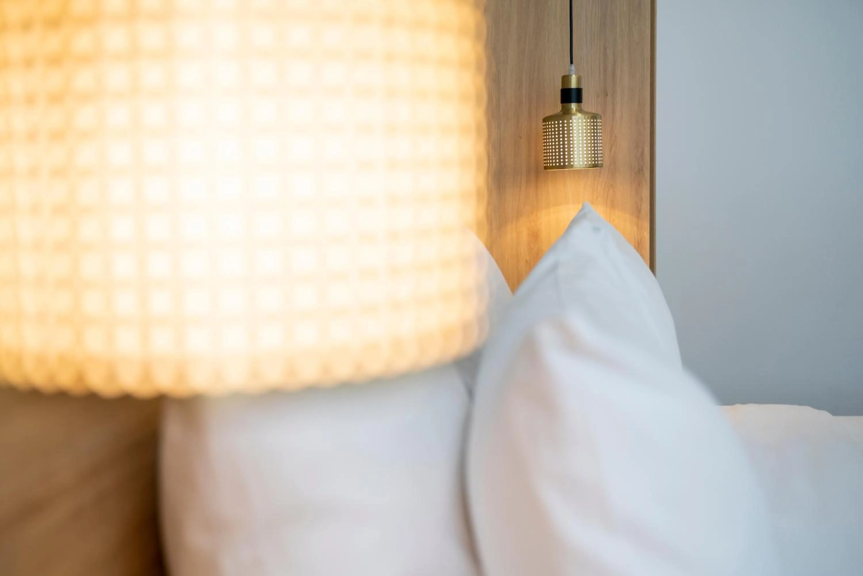 Bed in Magnolia Hotel