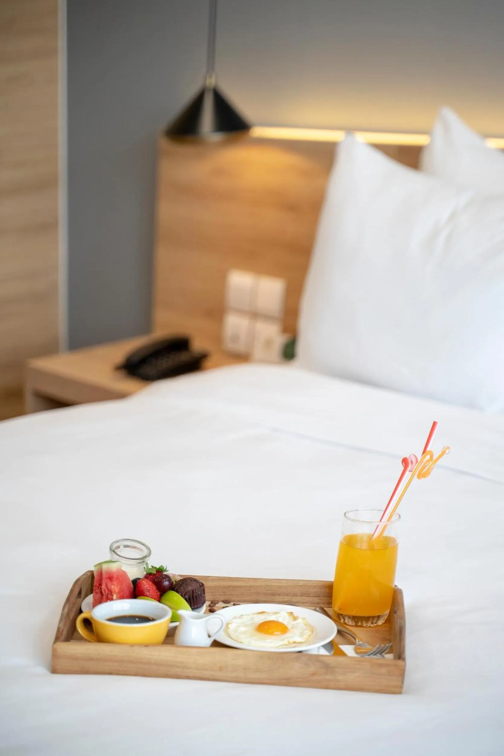 Bed in Magnolia Hotel