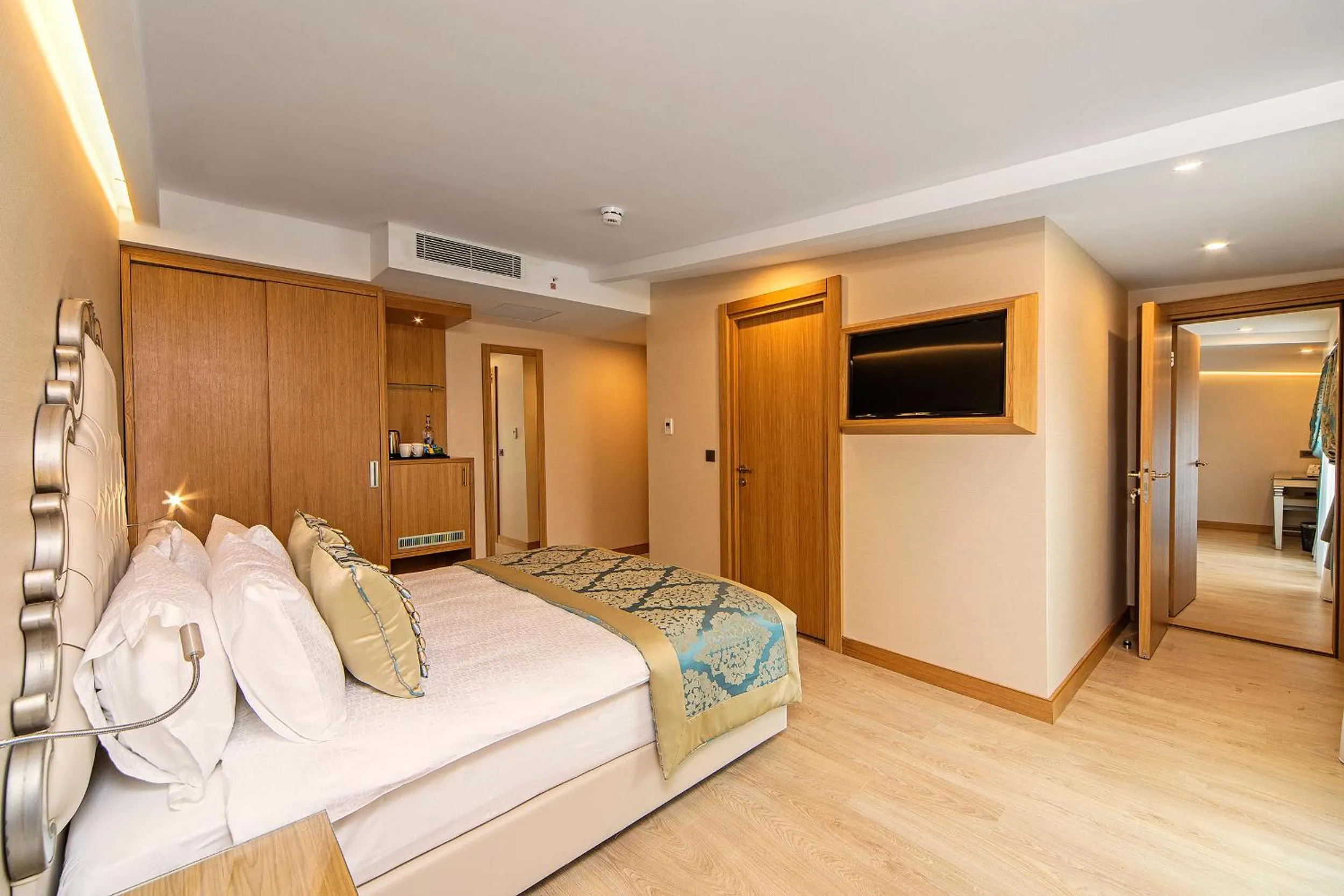 Bed in Mukarnas Taksim Hotel