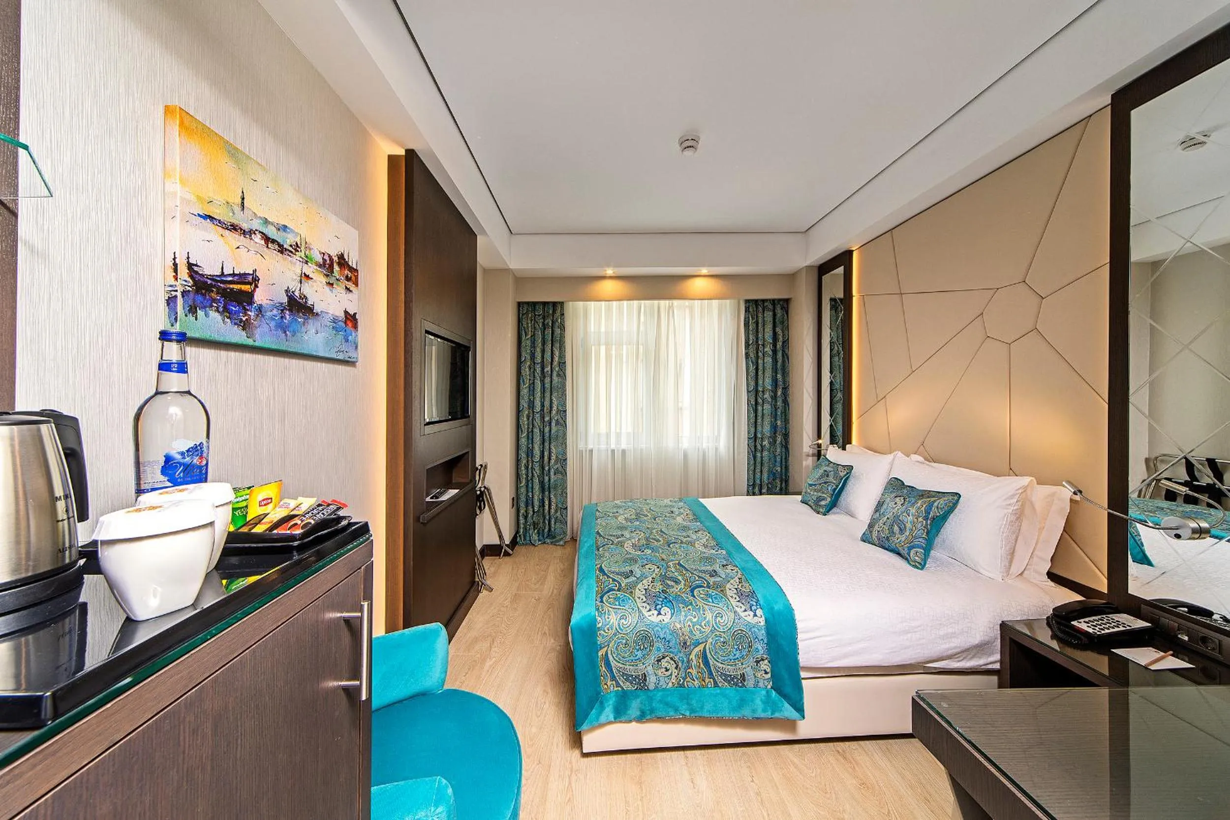 Bed in Mukarnas Taksim Hotel