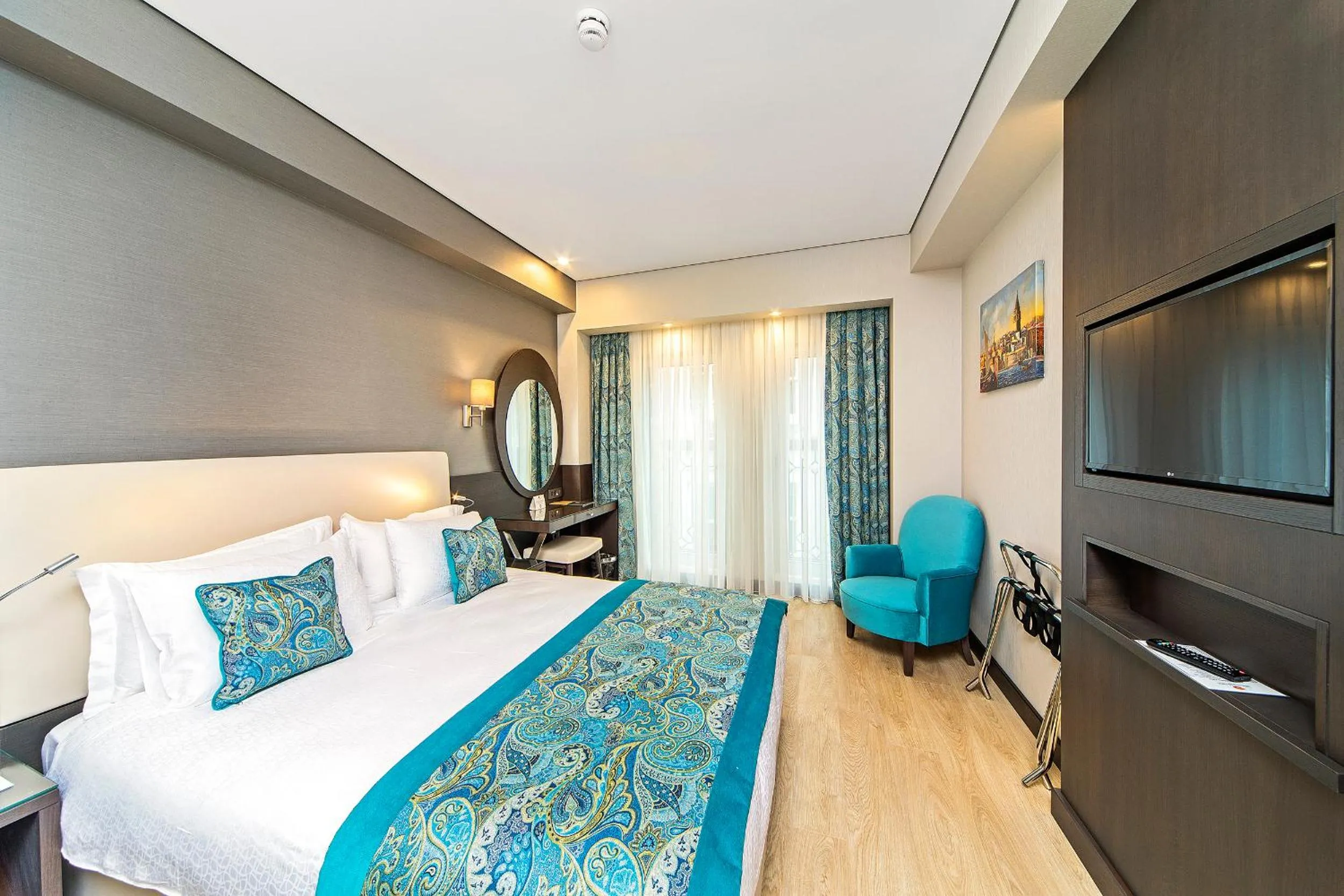 Bed in Mukarnas Taksim Hotel