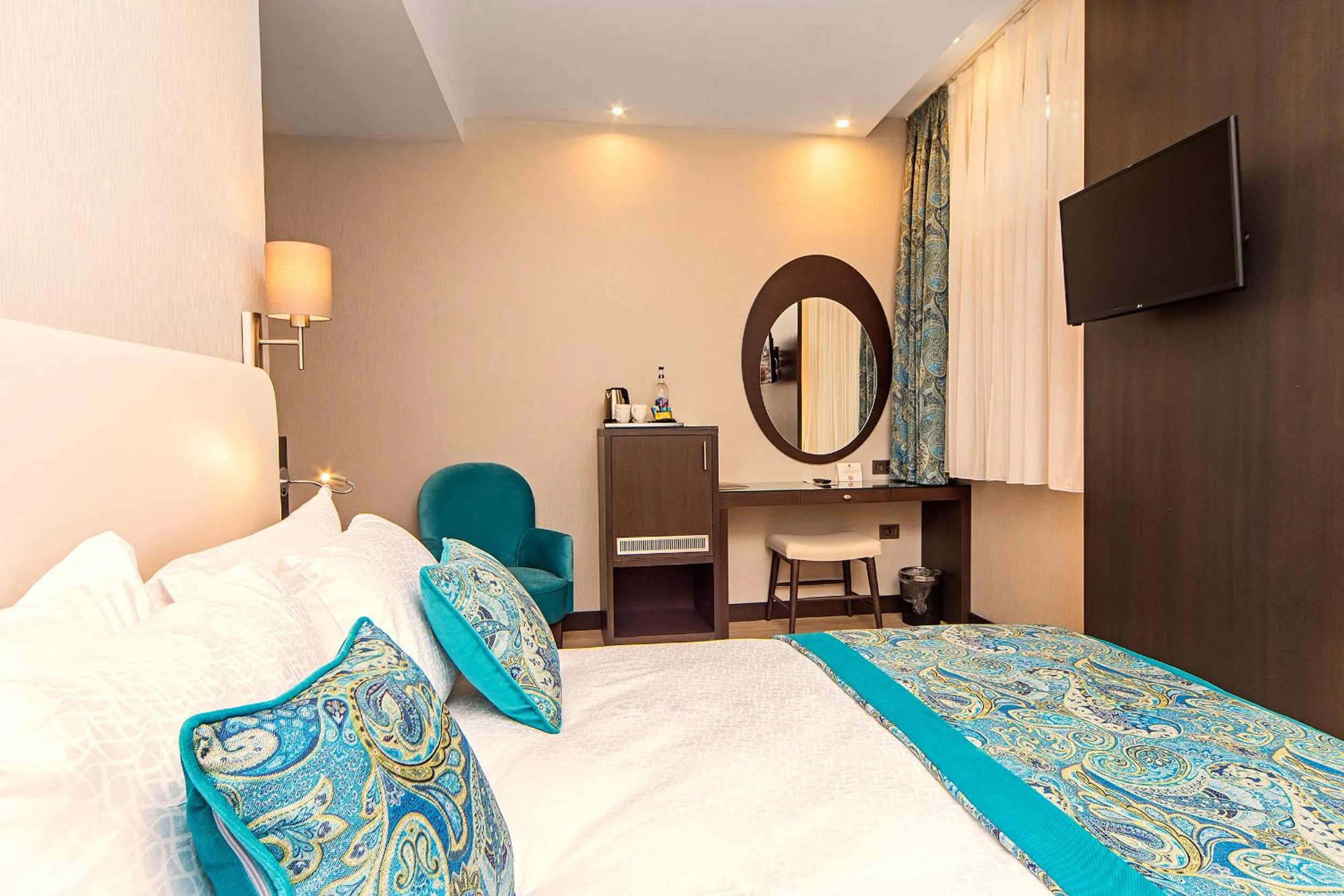 Bed in Mukarnas Taksim Hotel