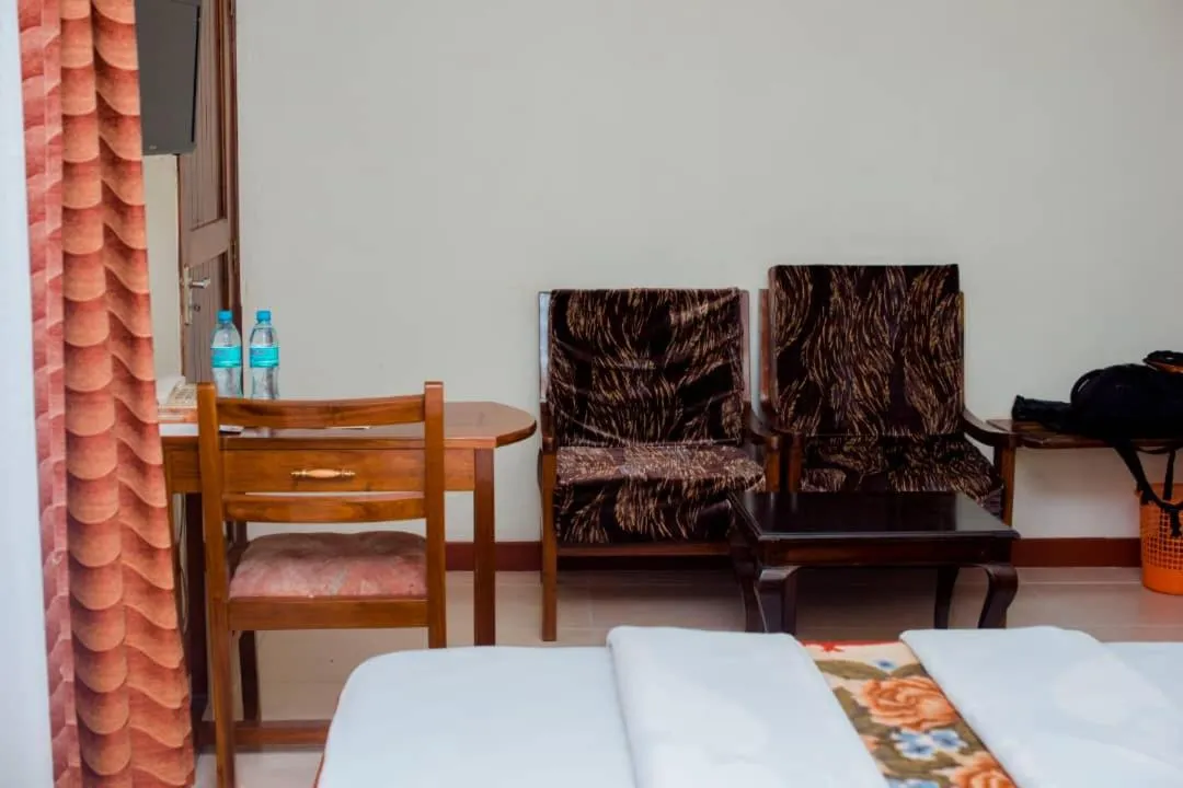 Bed in Kilimanjaro Crane Hotels & Safaris