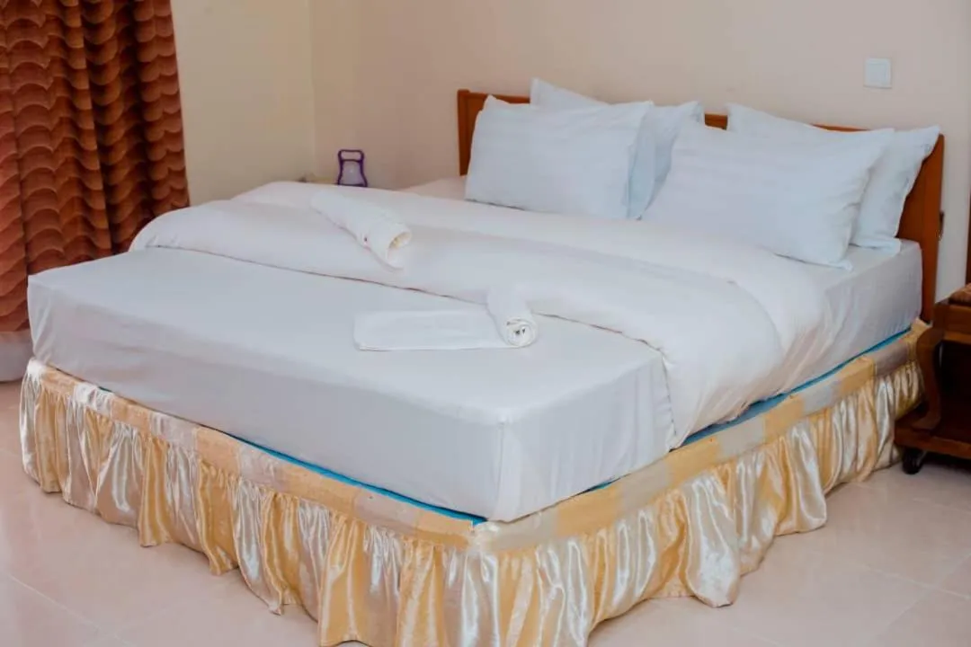 Bed in Kilimanjaro Crane Hotels & Safaris